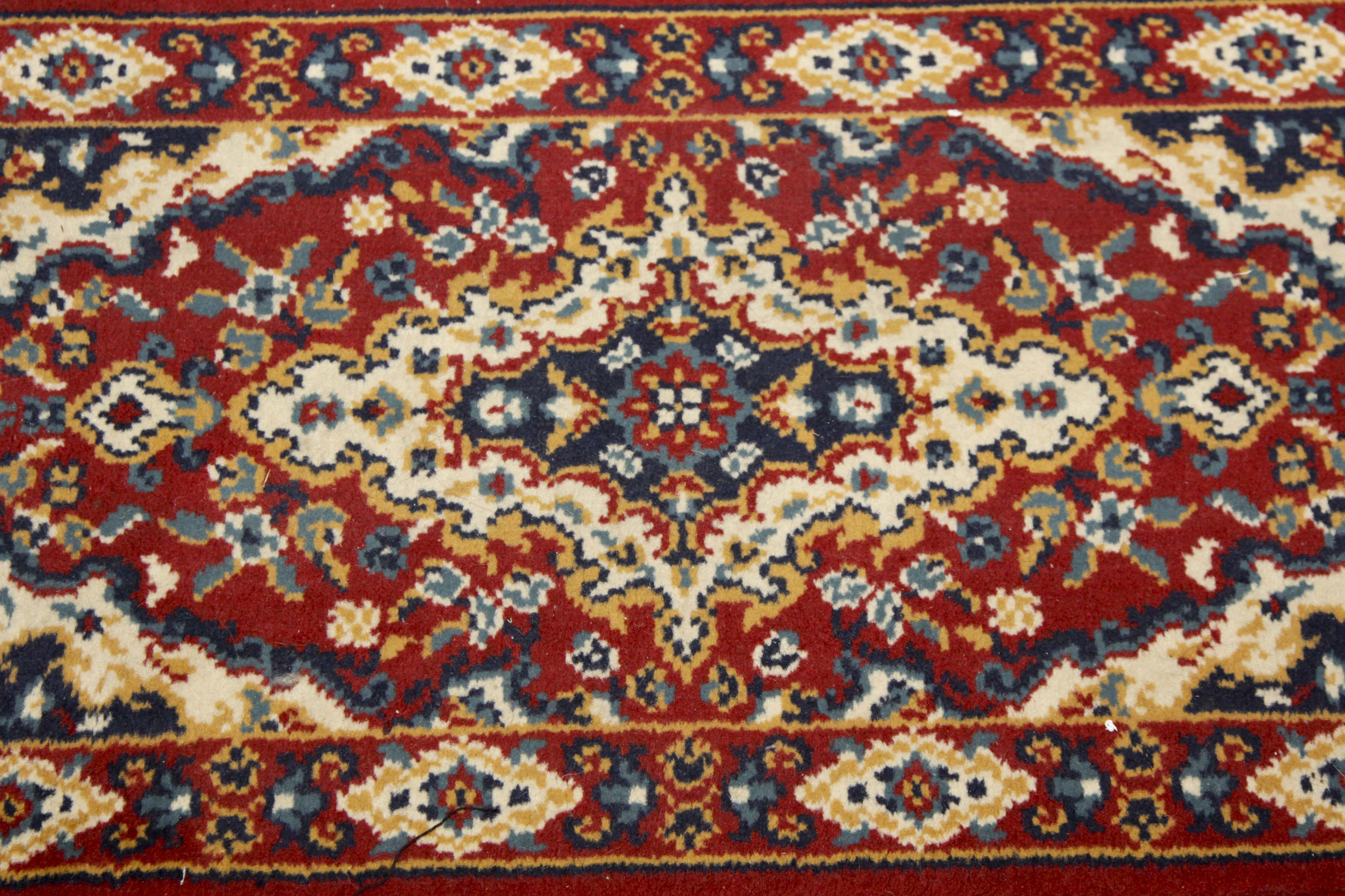 Two Small Machine Woven Accent Rugs