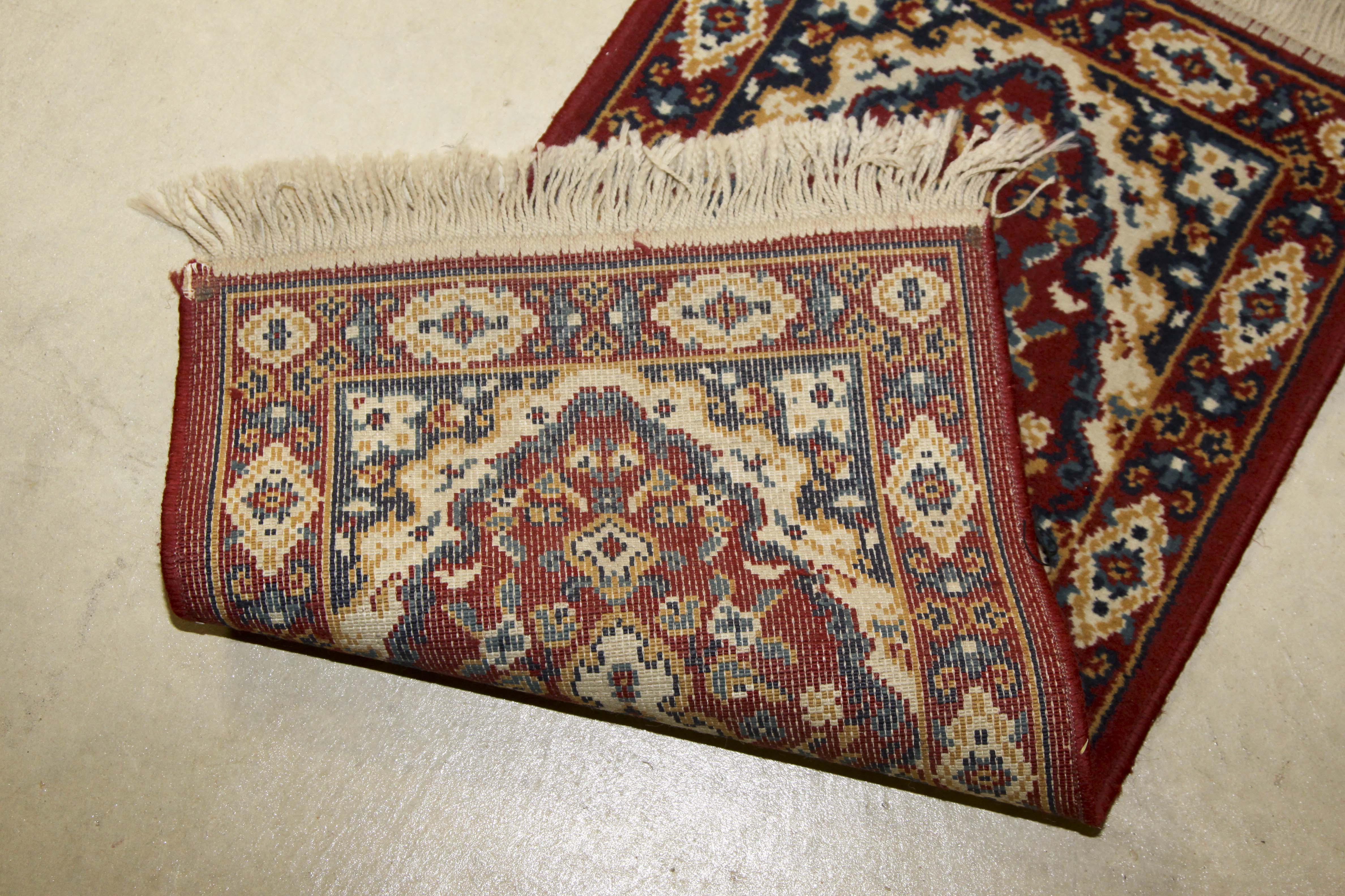 Two Small Machine Woven Accent Rugs