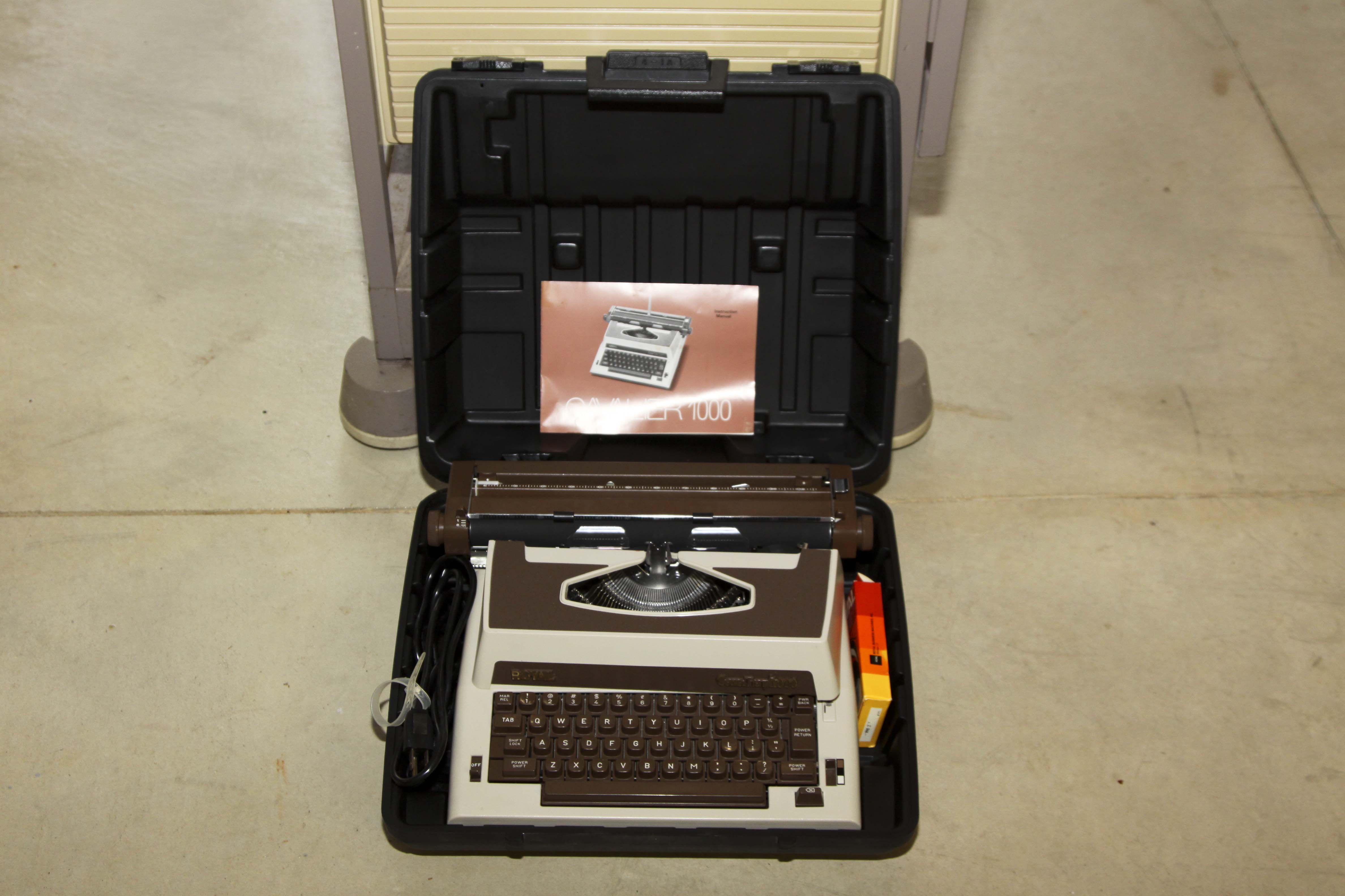 Two Vintage Electric Typewriters With Stand