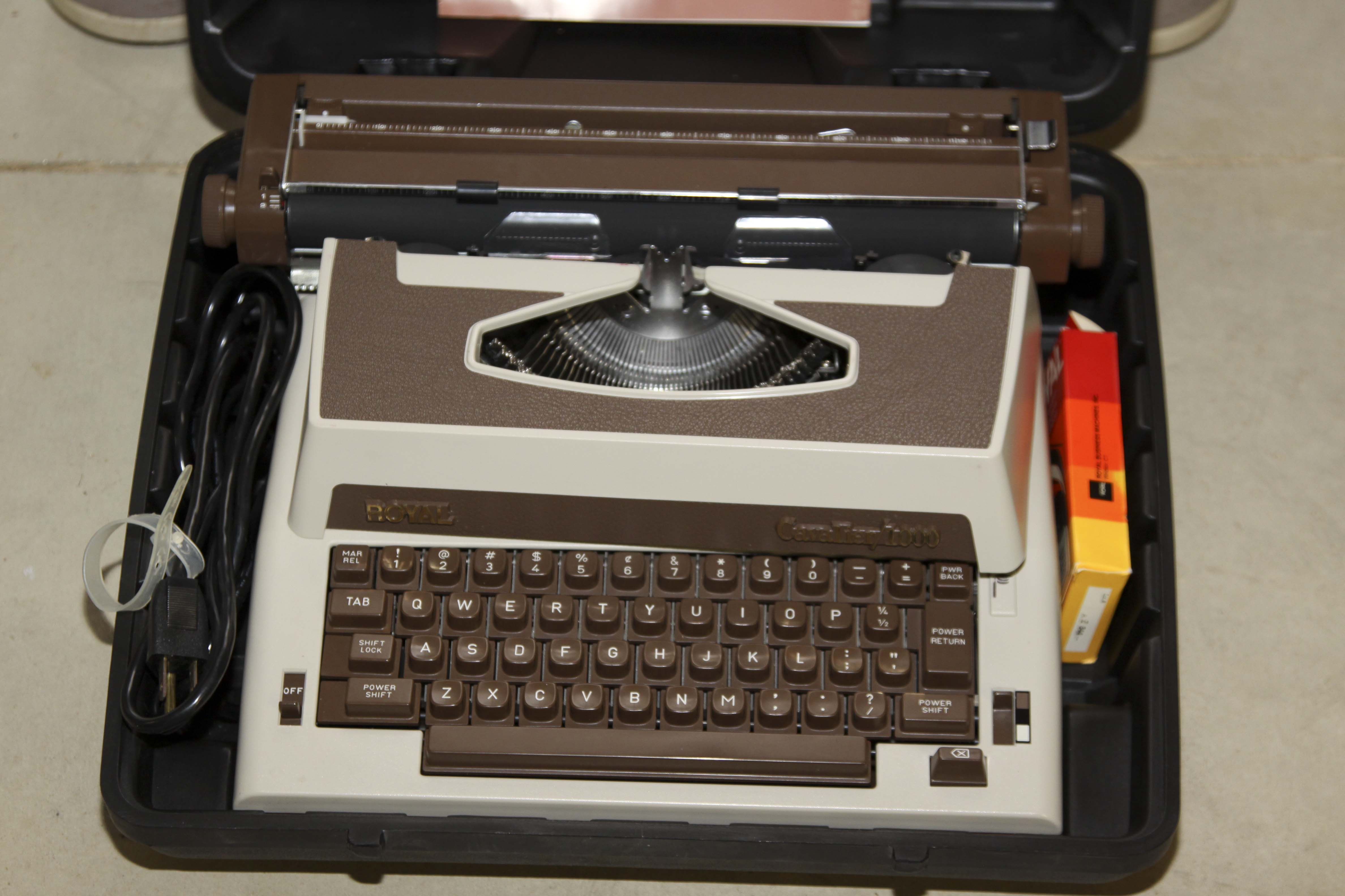 Two Vintage Electric Typewriters With Stand