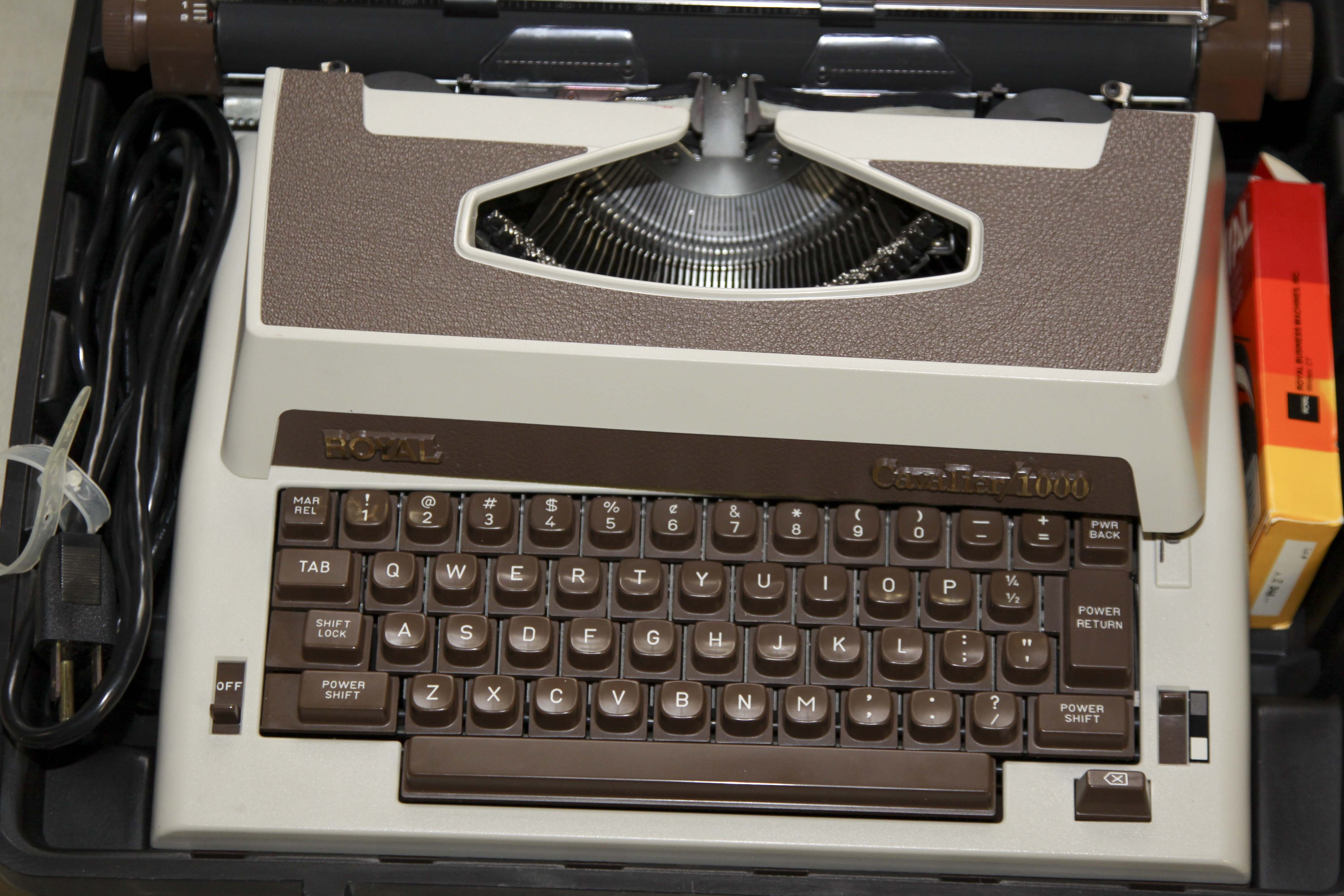 Two Vintage Electric Typewriters With Stand