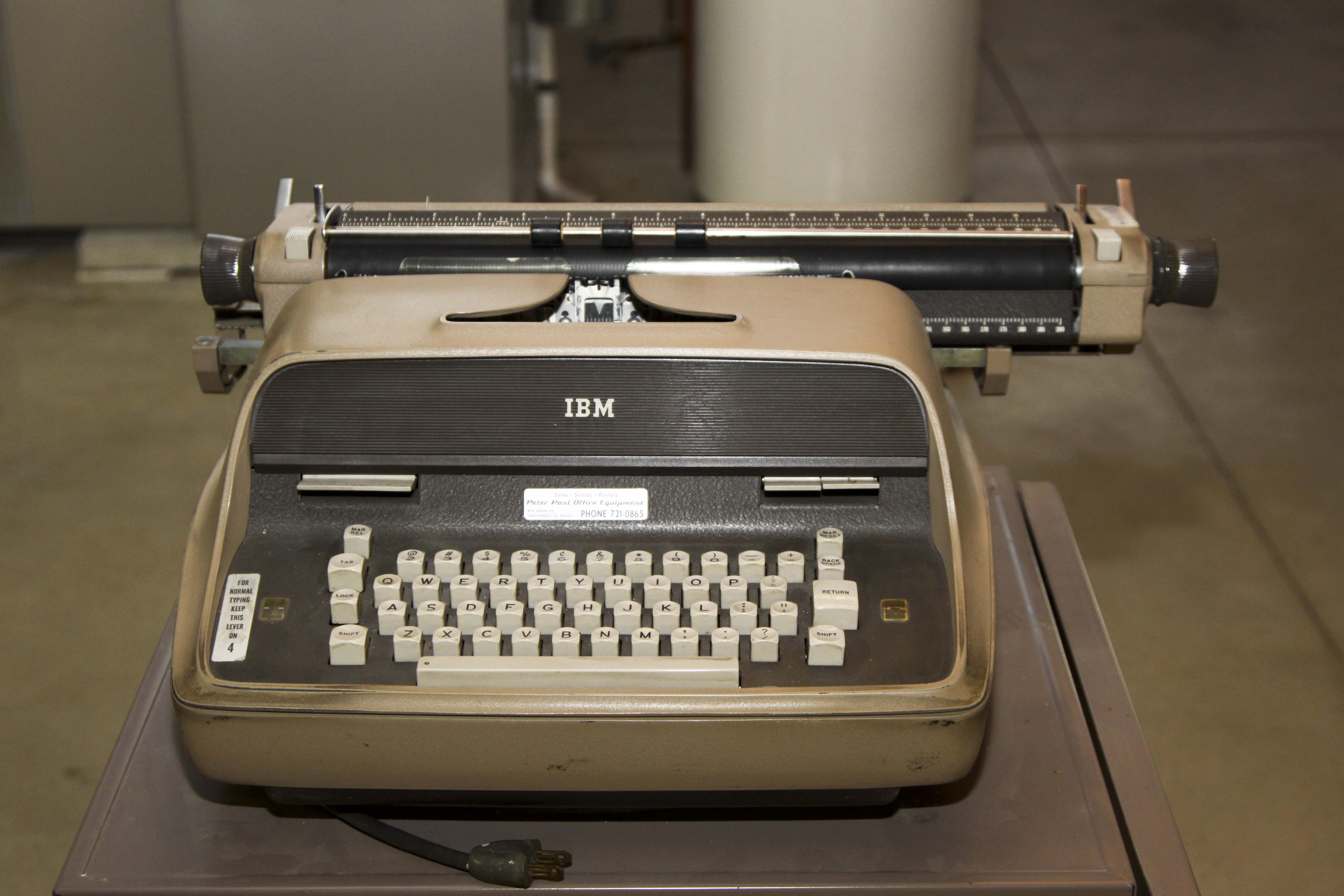 Two Vintage Electric Typewriters With Stand