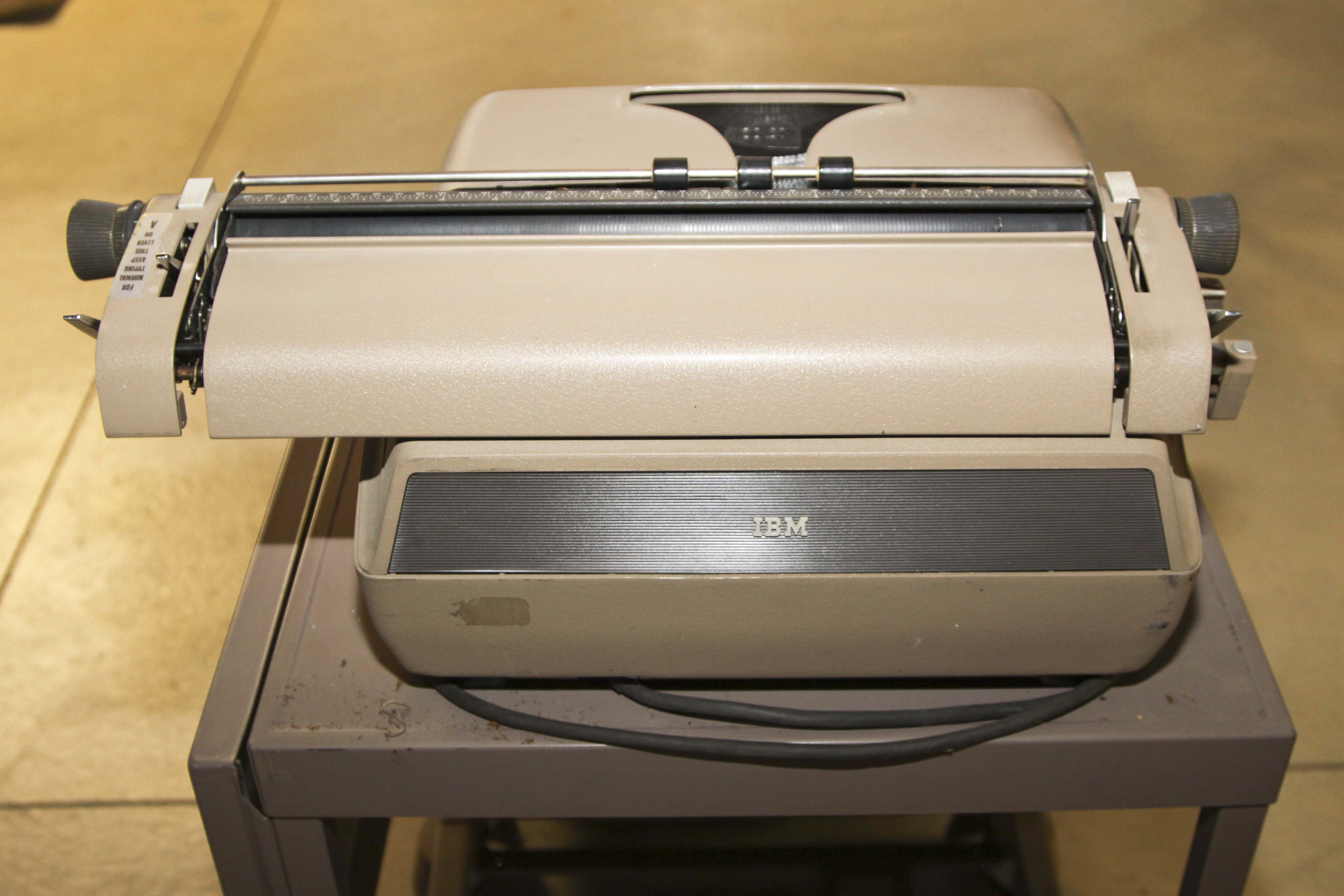 Two Vintage Electric Typewriters With Stand