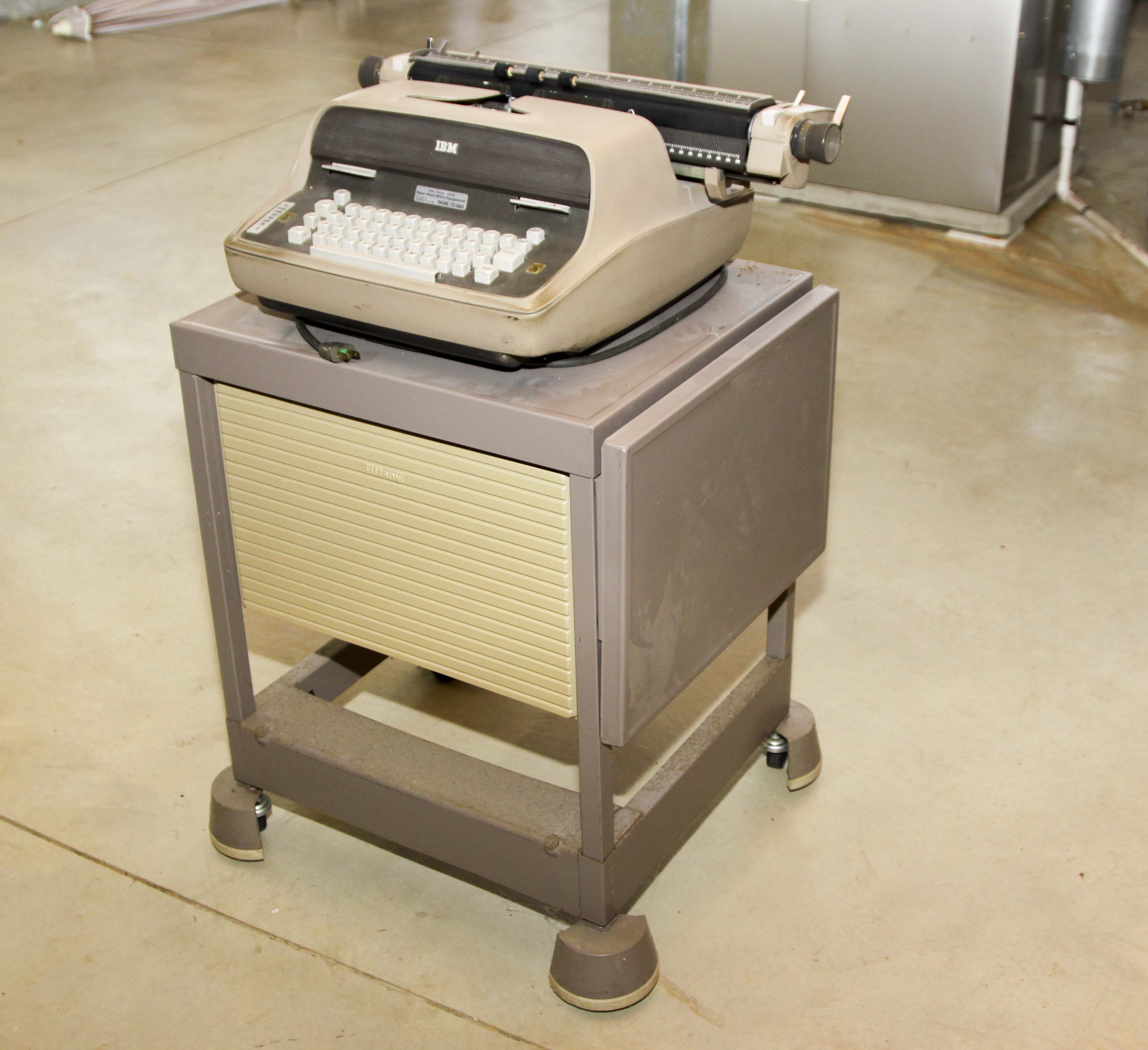 Two Vintage Electric Typewriters With Stand