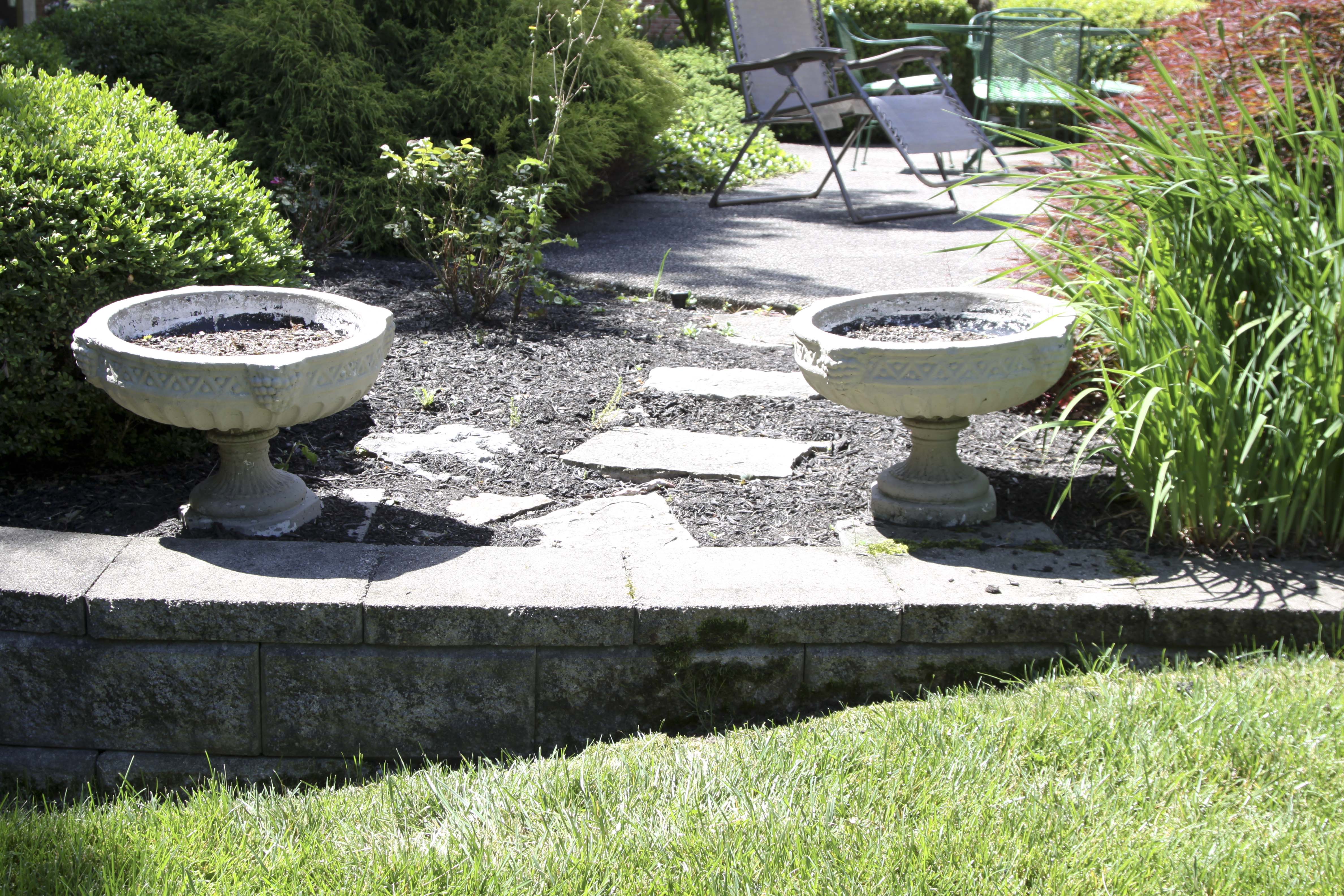 Pair of Cement Urns and White Garden Chair