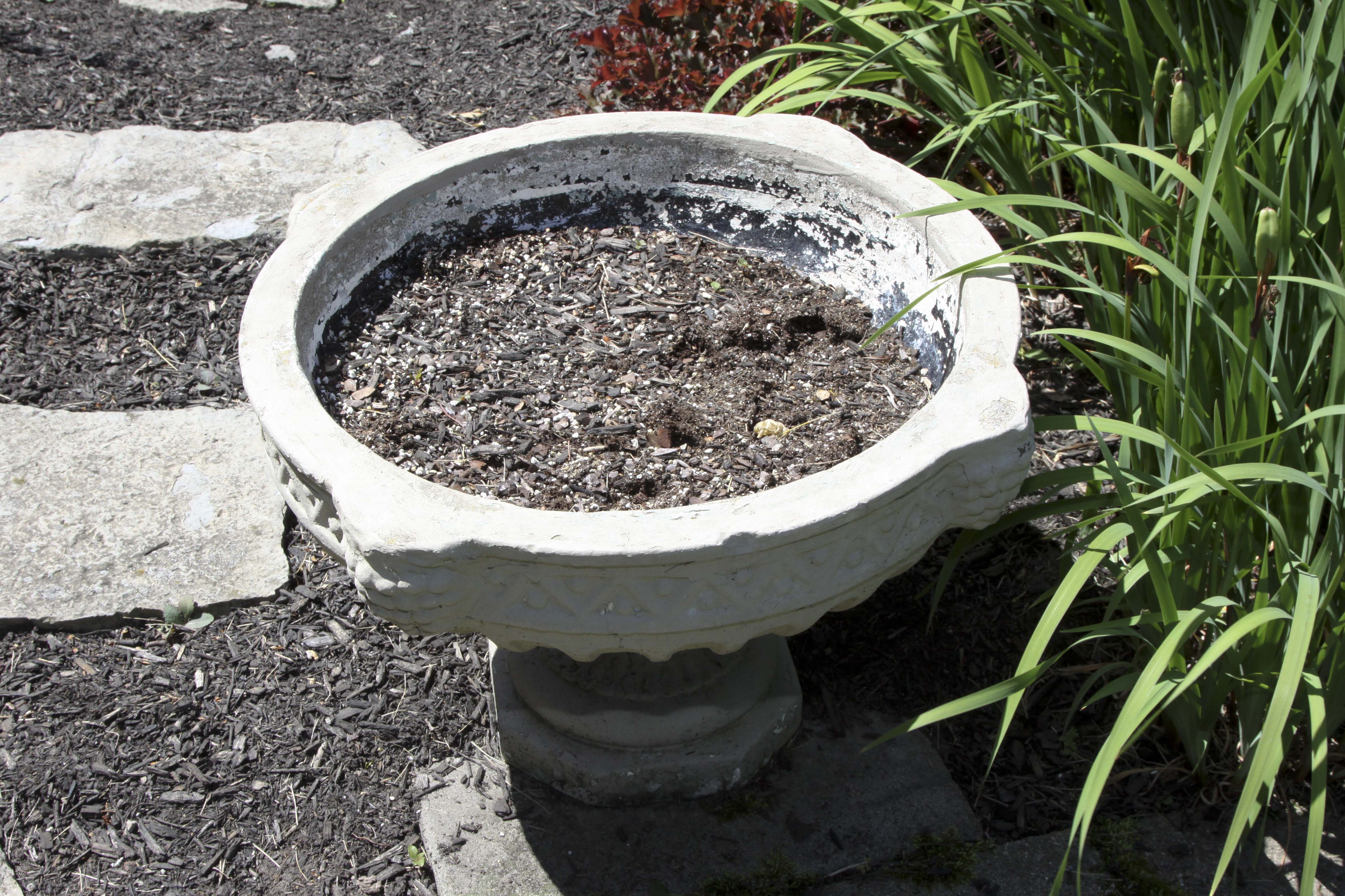 Pair of Cement Urns and White Garden Chair