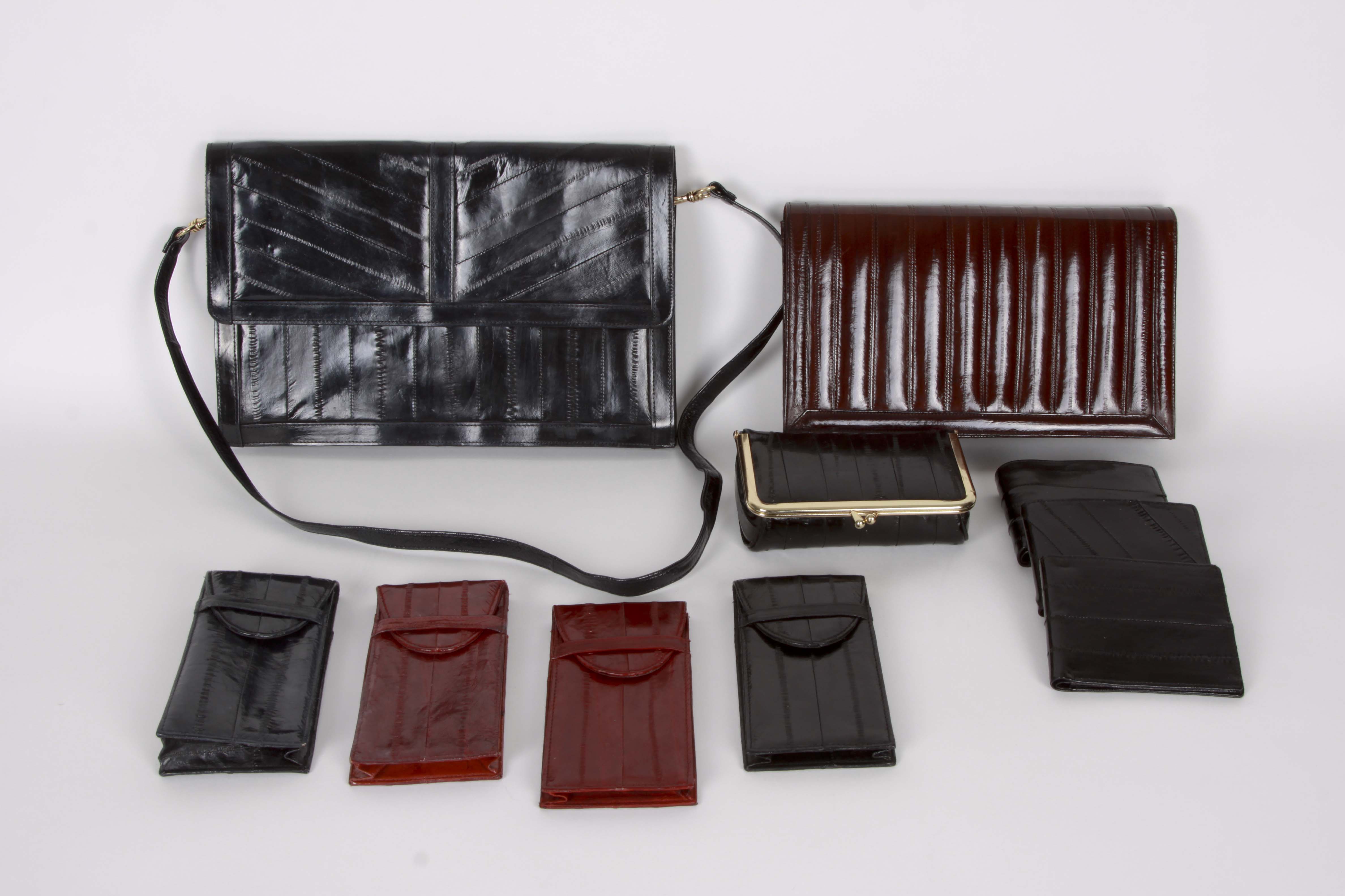 A Collection of Genuine Eel Skin Handbags and Wallets