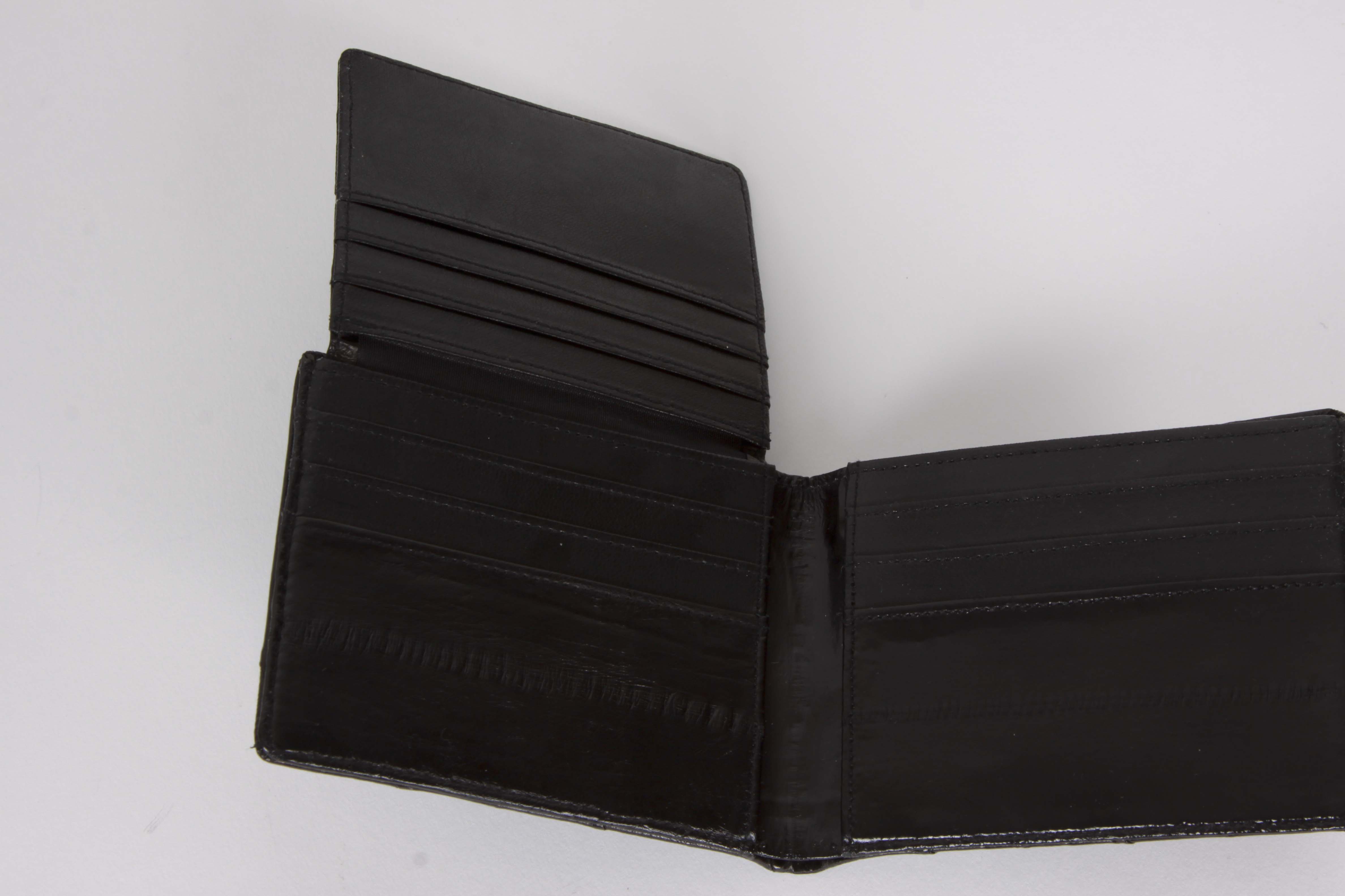 A Collection of Genuine Eel Skin Handbags and Wallets