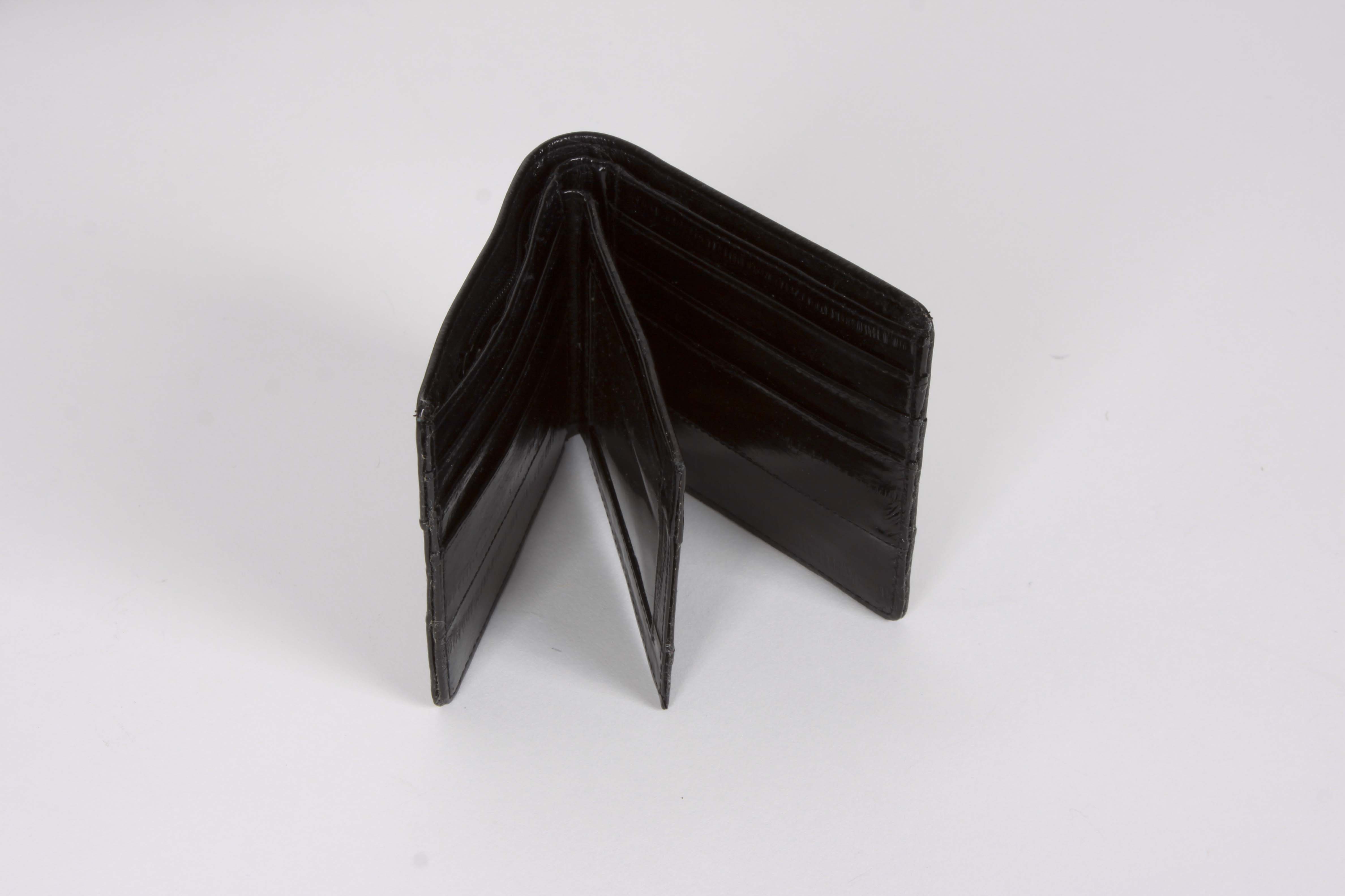 A Collection of Genuine Eel Skin Handbags and Wallets