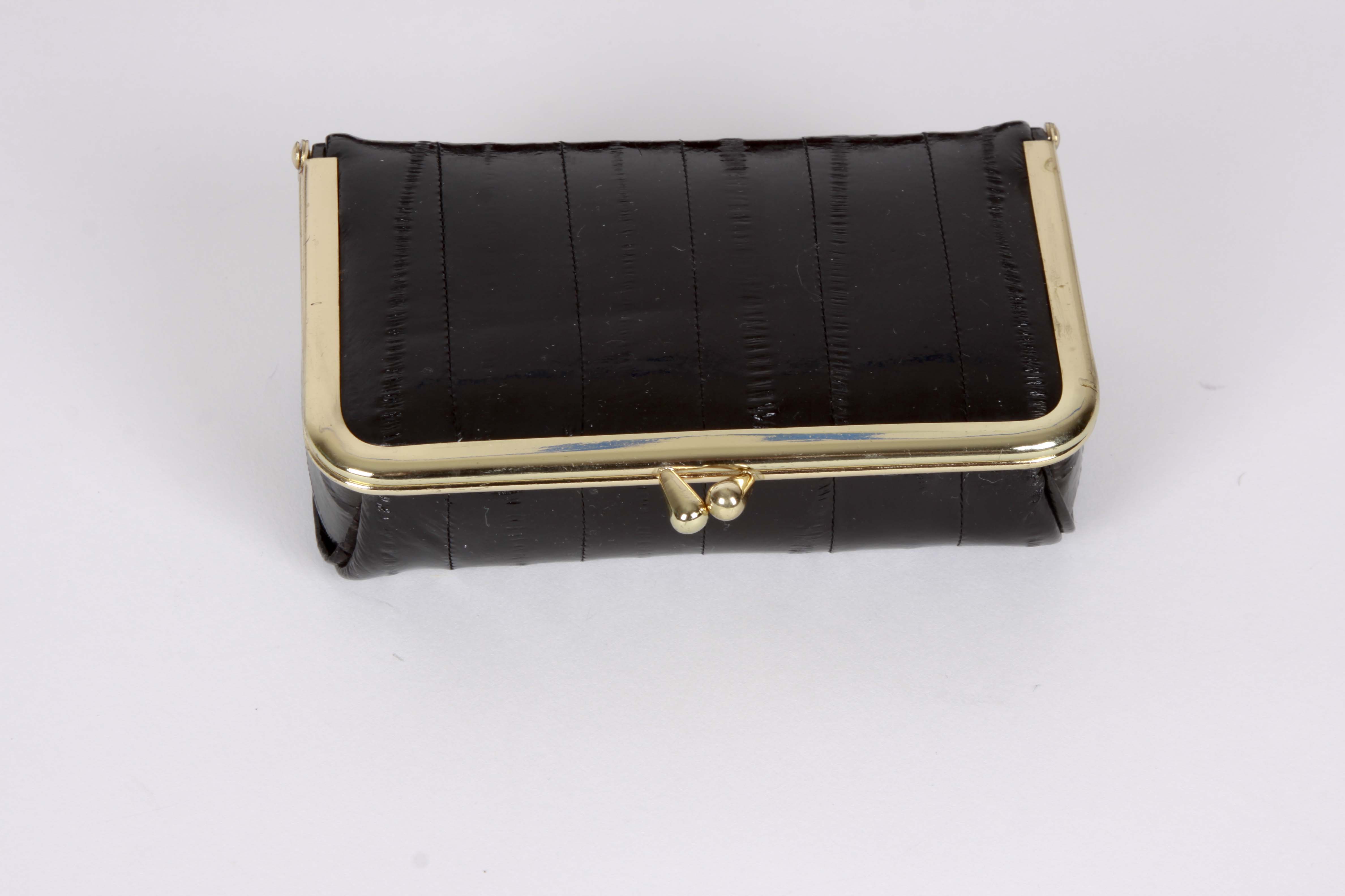A Collection of Genuine Eel Skin Handbags and Wallets