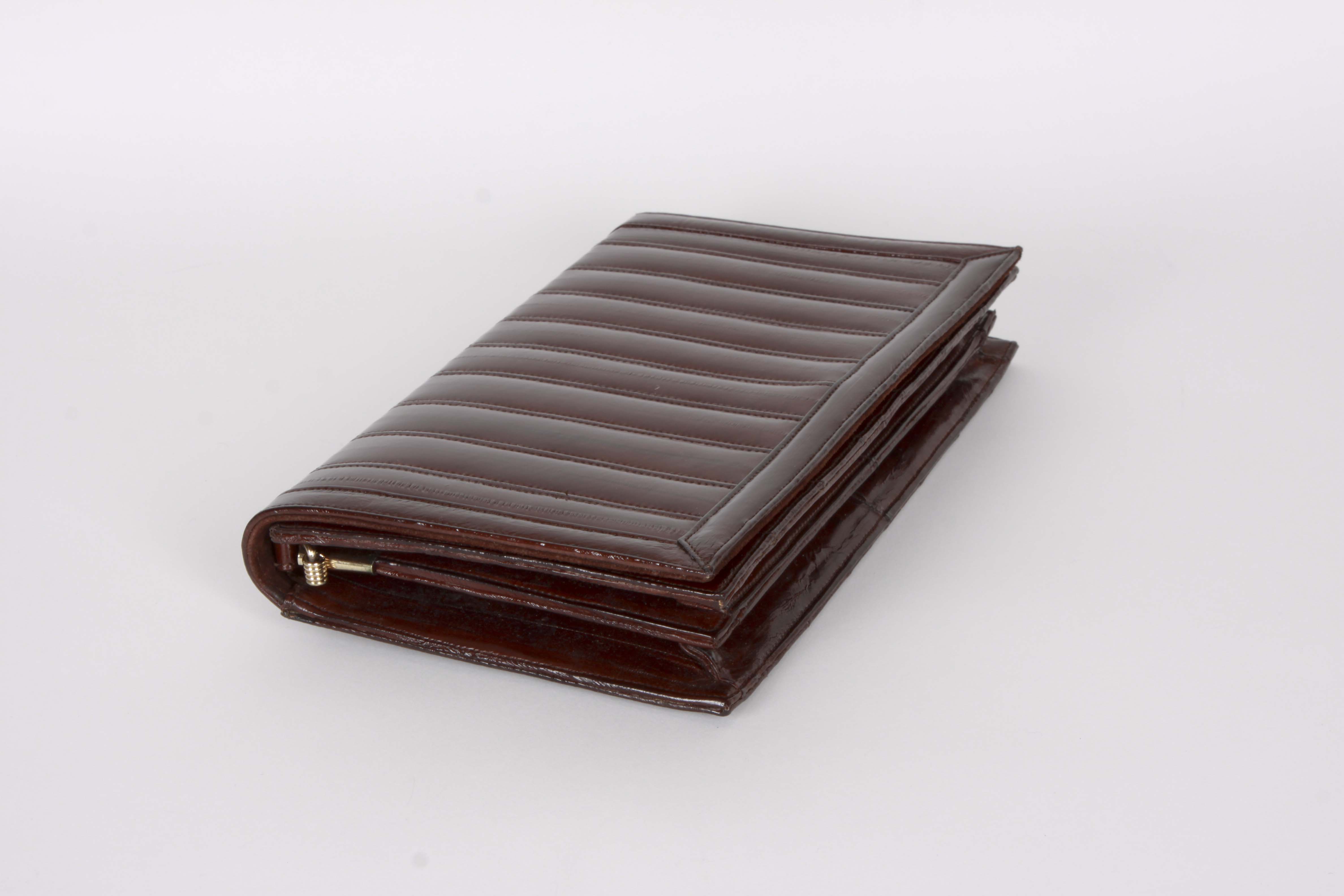 A Collection of Genuine Eel Skin Handbags and Wallets