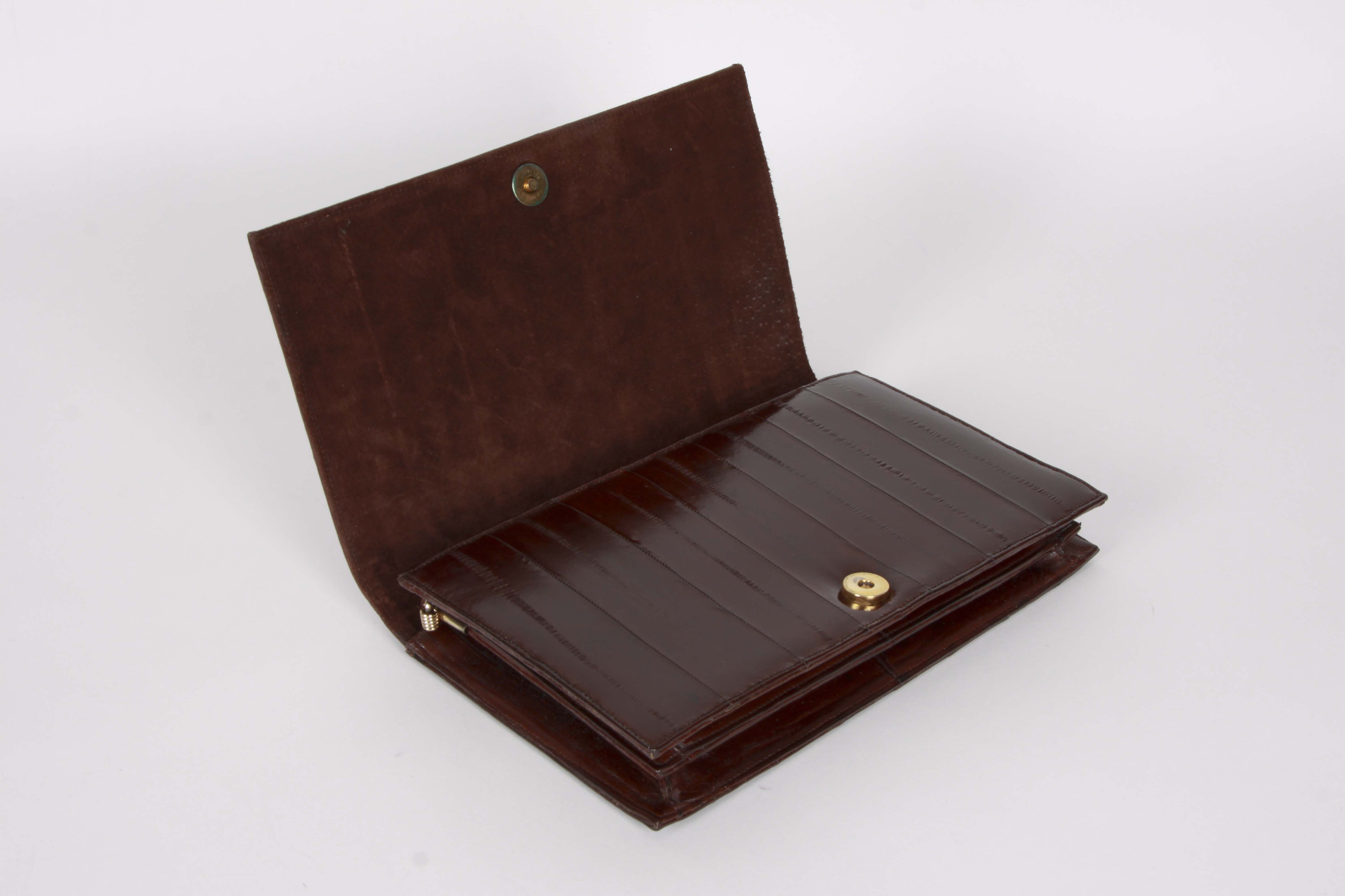 A Collection of Genuine Eel Skin Handbags and Wallets