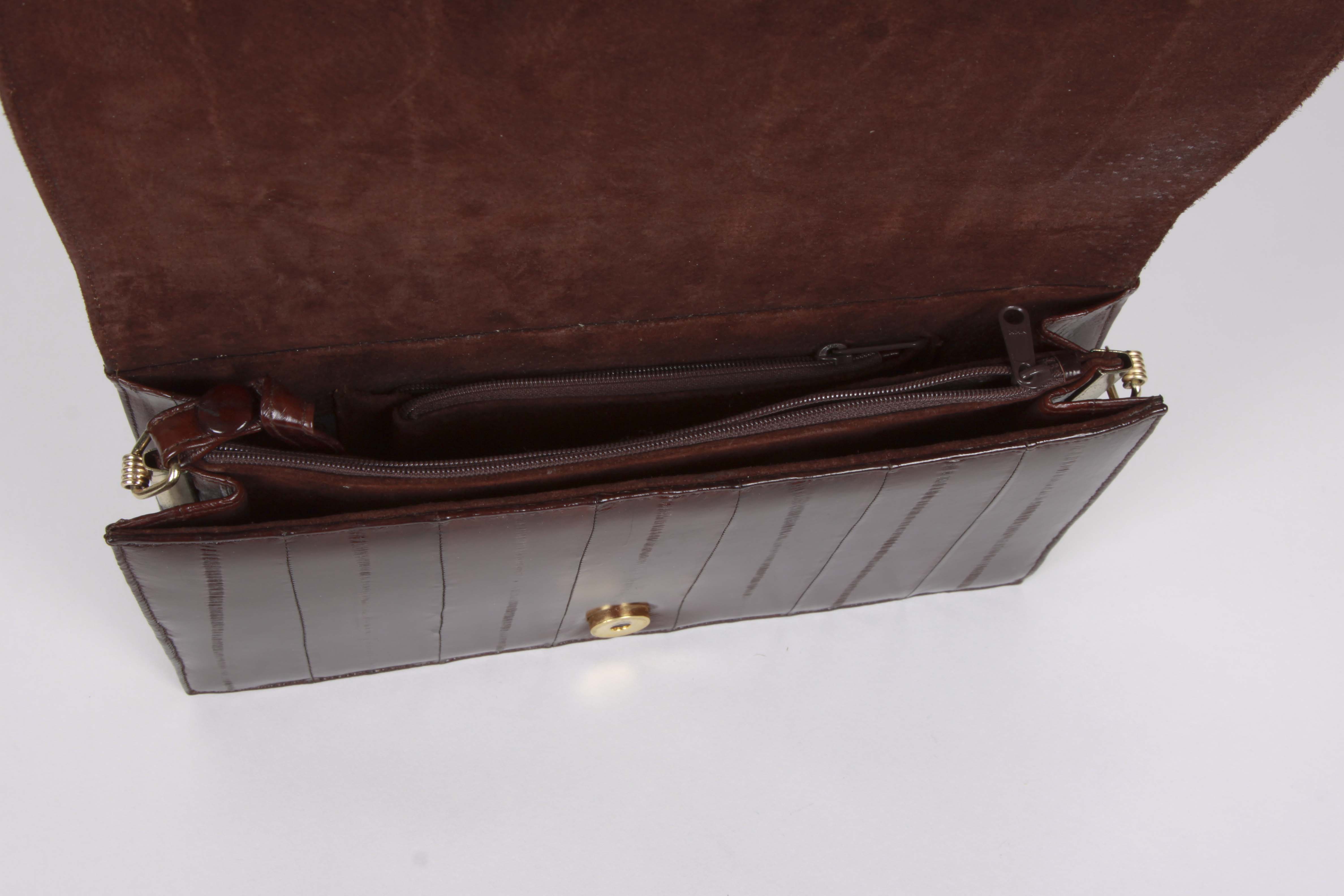 A Collection of Genuine Eel Skin Handbags and Wallets