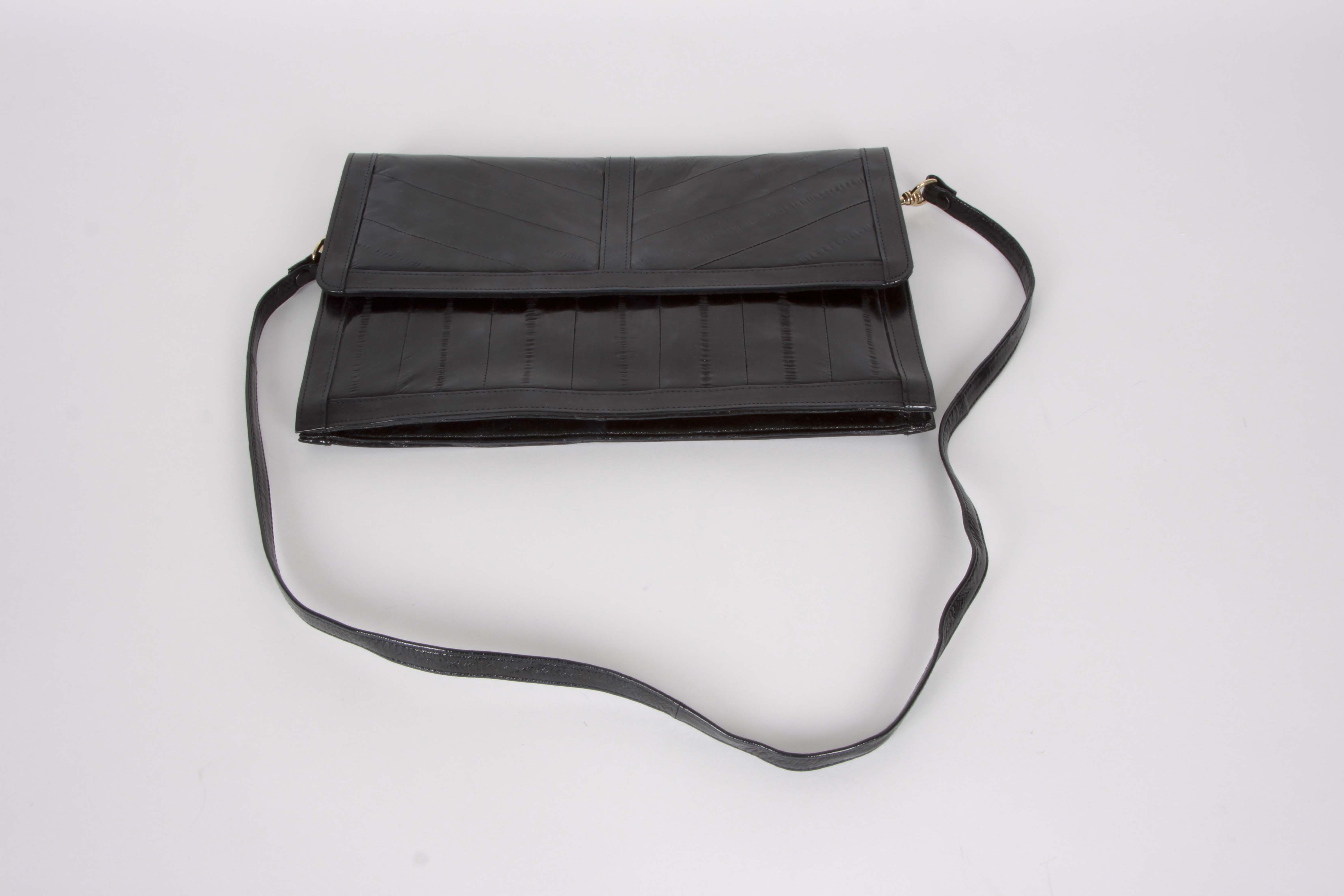 A Collection of Genuine Eel Skin Handbags and Wallets