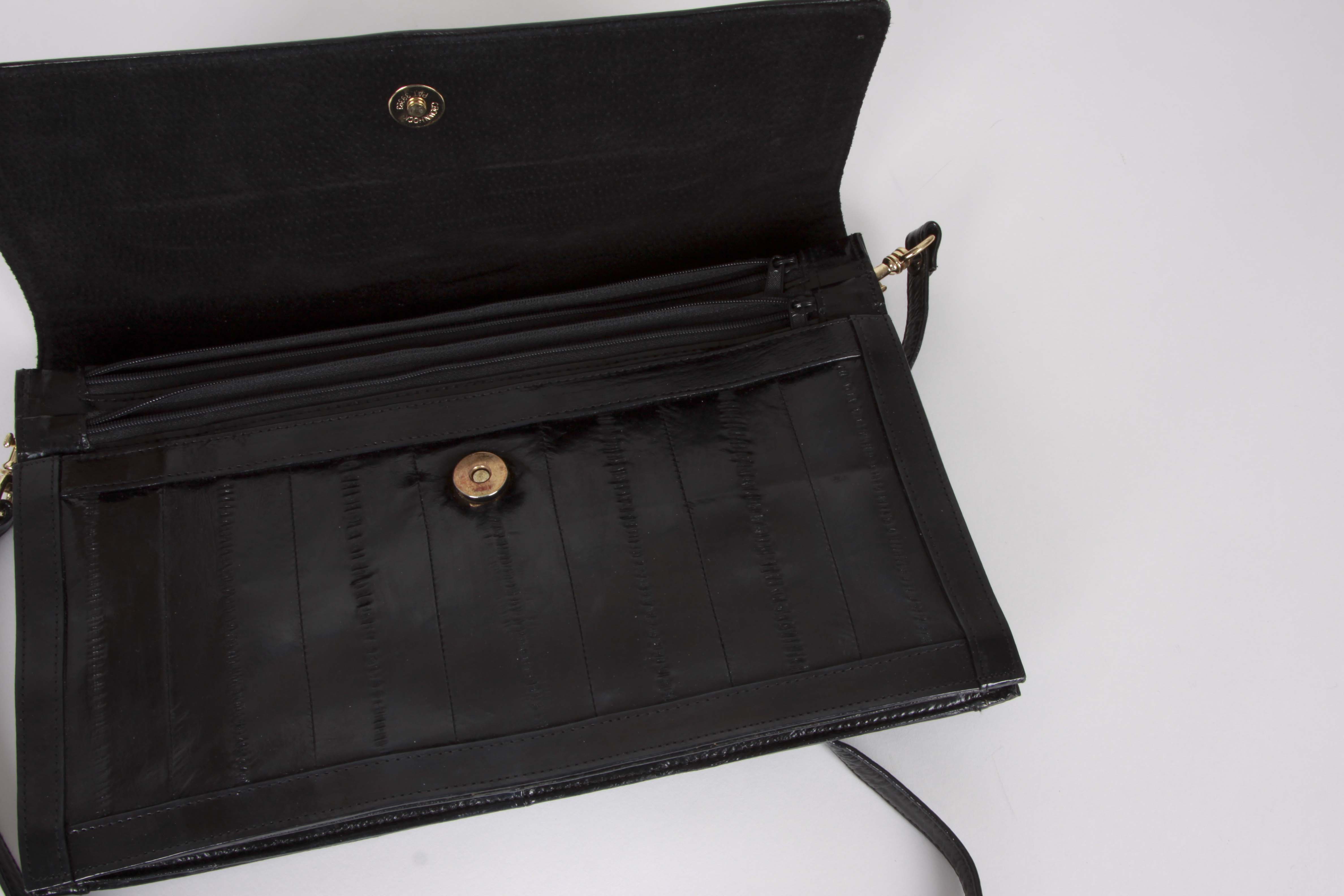 A Collection of Genuine Eel Skin Handbags and Wallets