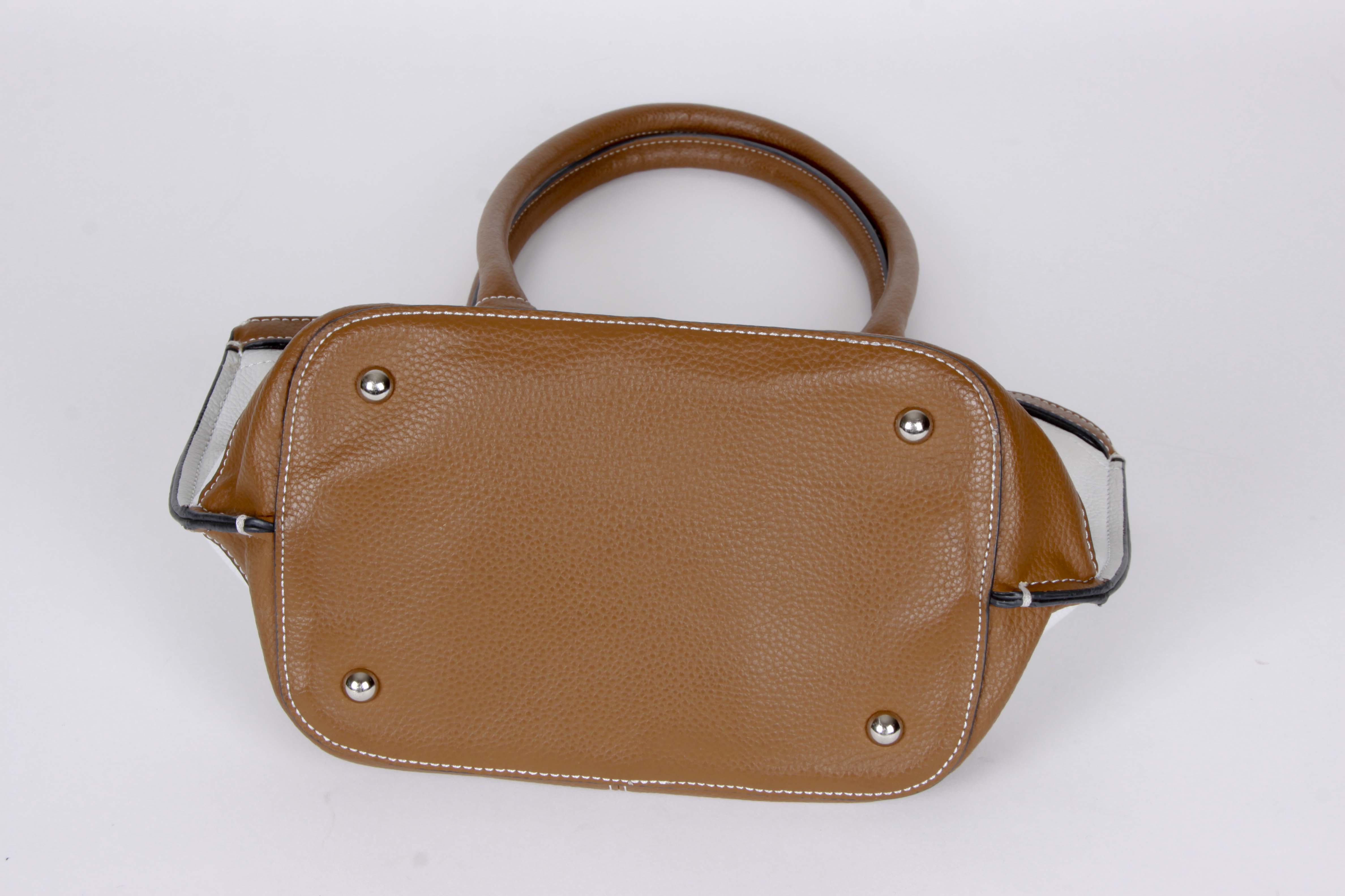 Pairing of Handbags by Susan Gail and Tignanello