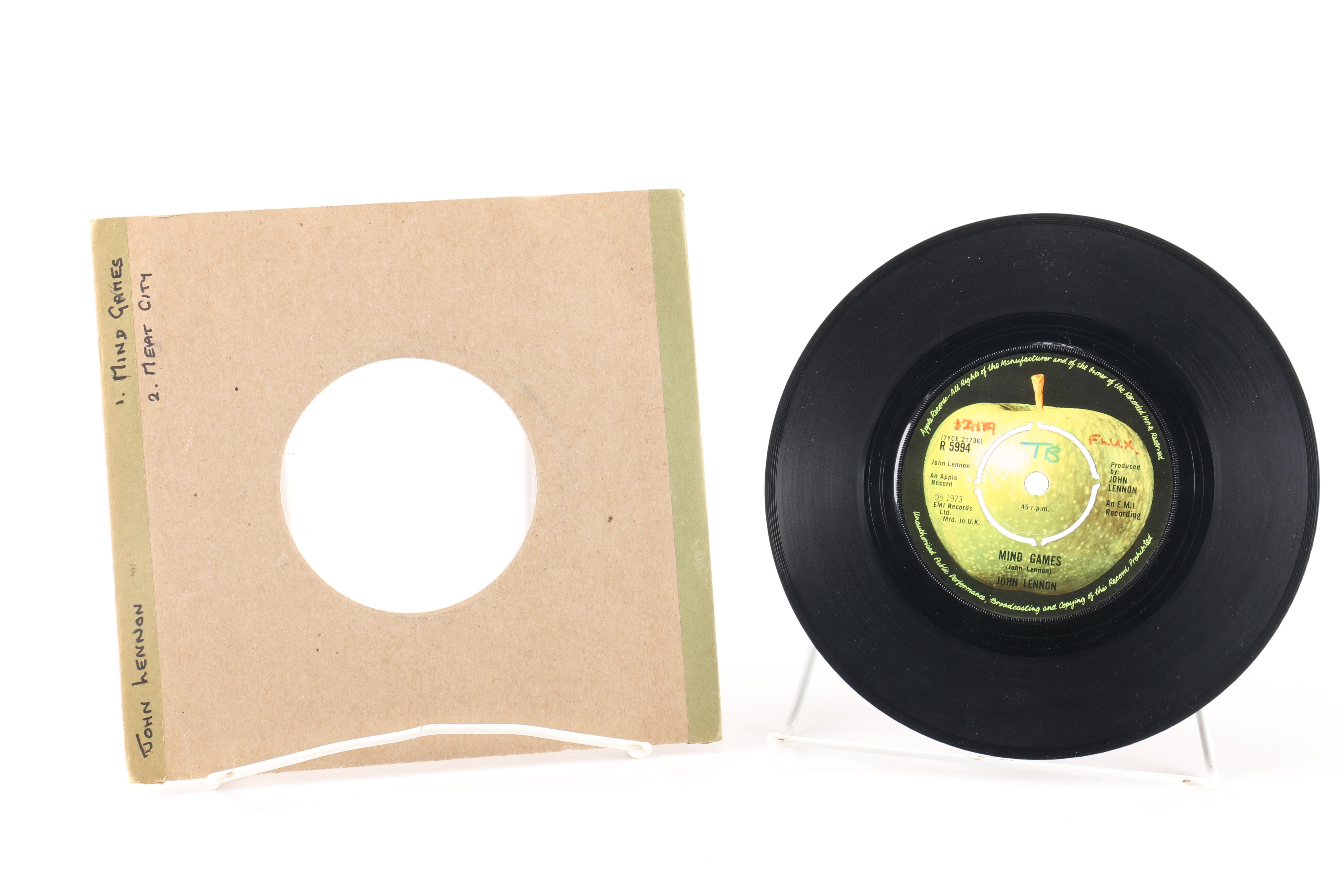 Beatles "She Loves You" on Parlophone and John Lennon Singles