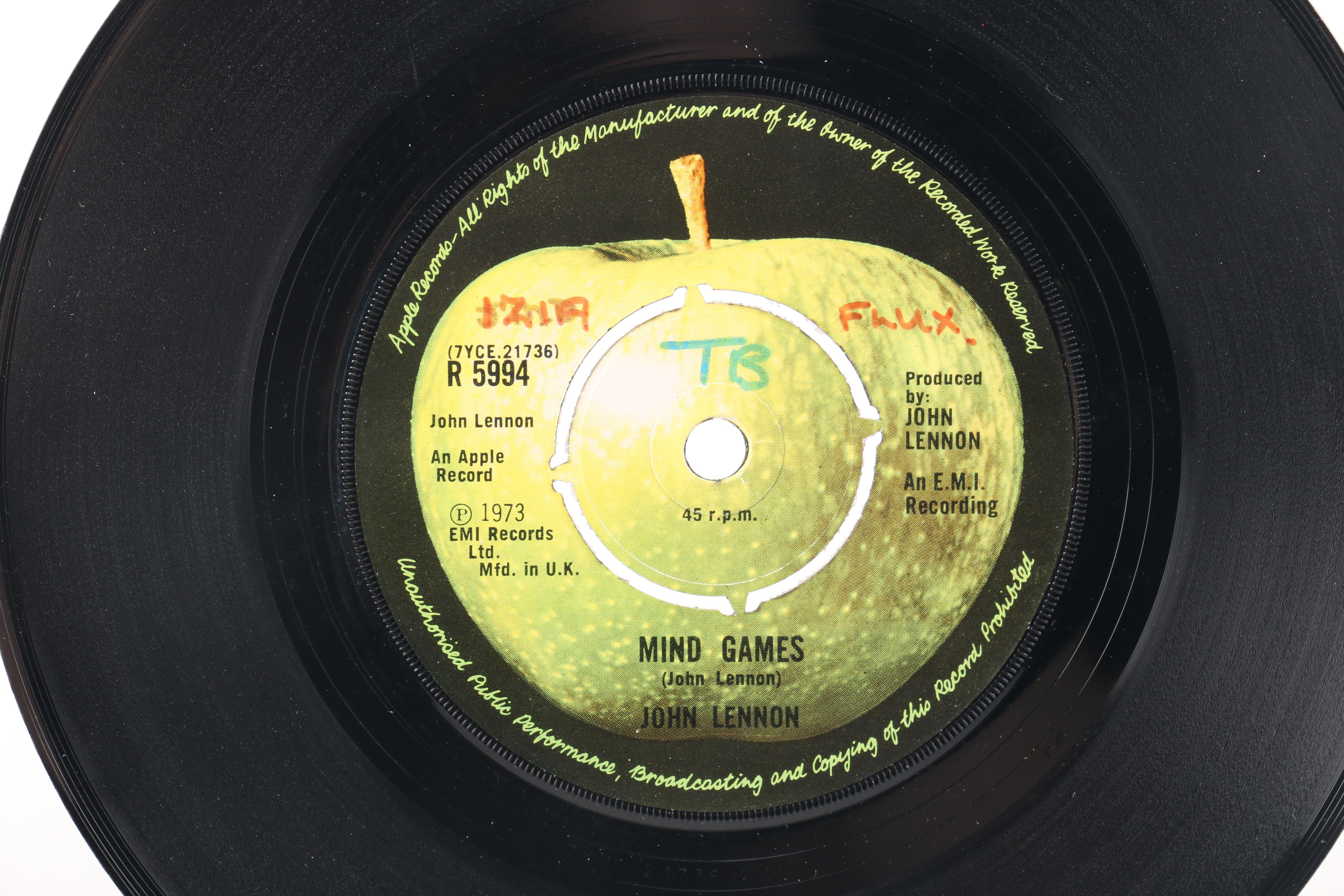 Beatles "She Loves You" on Parlophone and John Lennon Singles