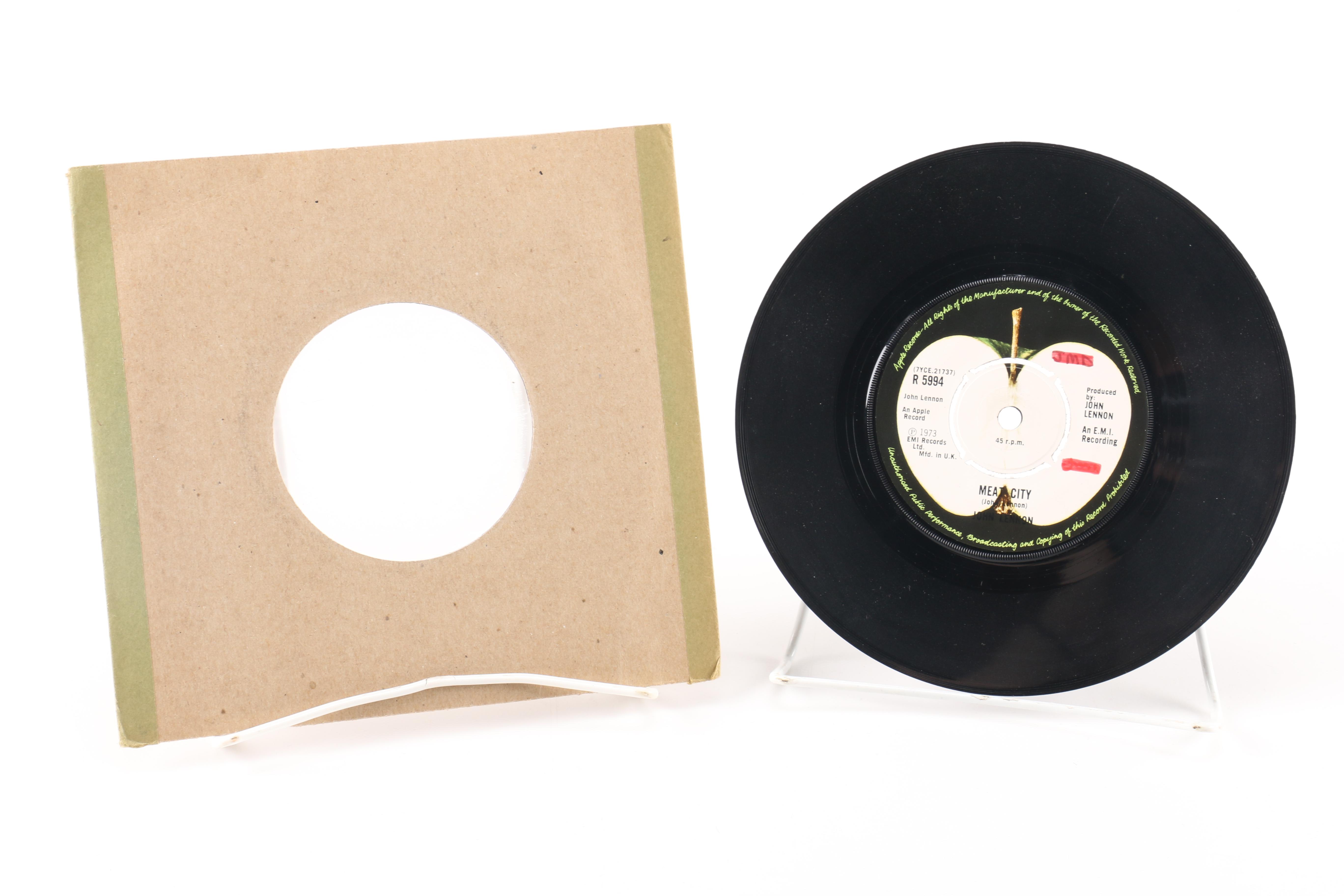 Beatles "She Loves You" on Parlophone and John Lennon Singles