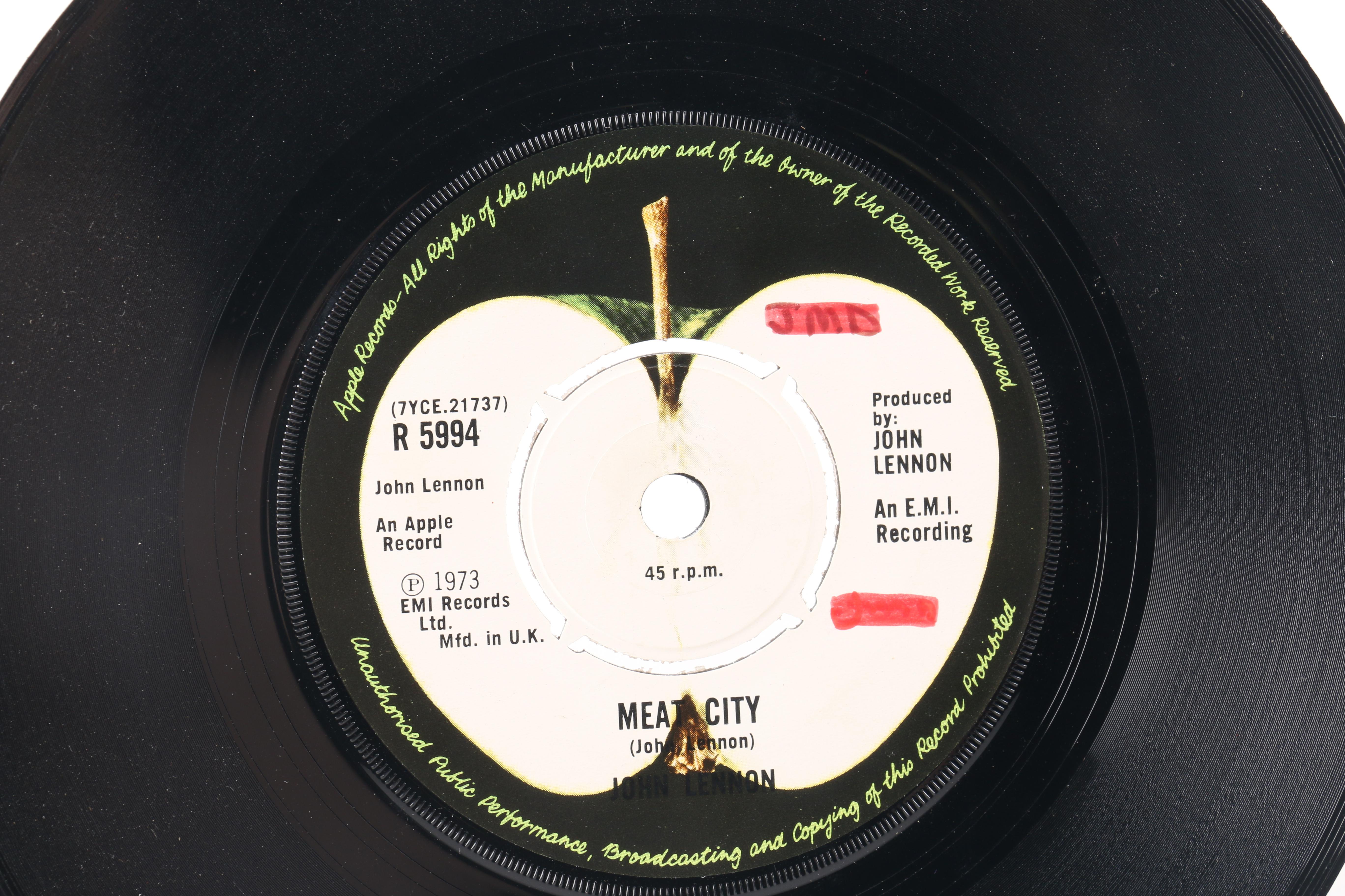 Beatles "She Loves You" on Parlophone and John Lennon Singles