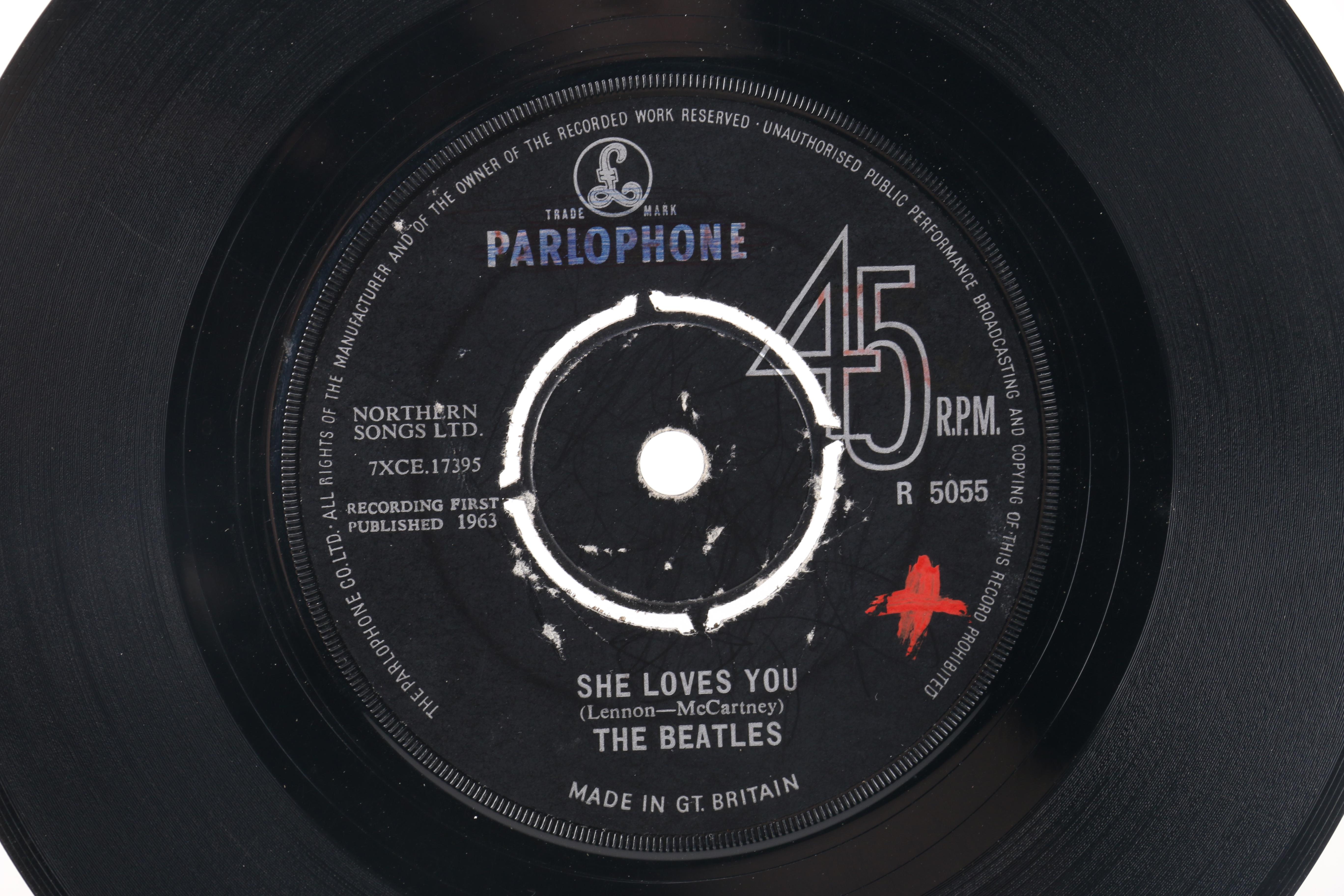 Beatles "She Loves You" on Parlophone and John Lennon Singles