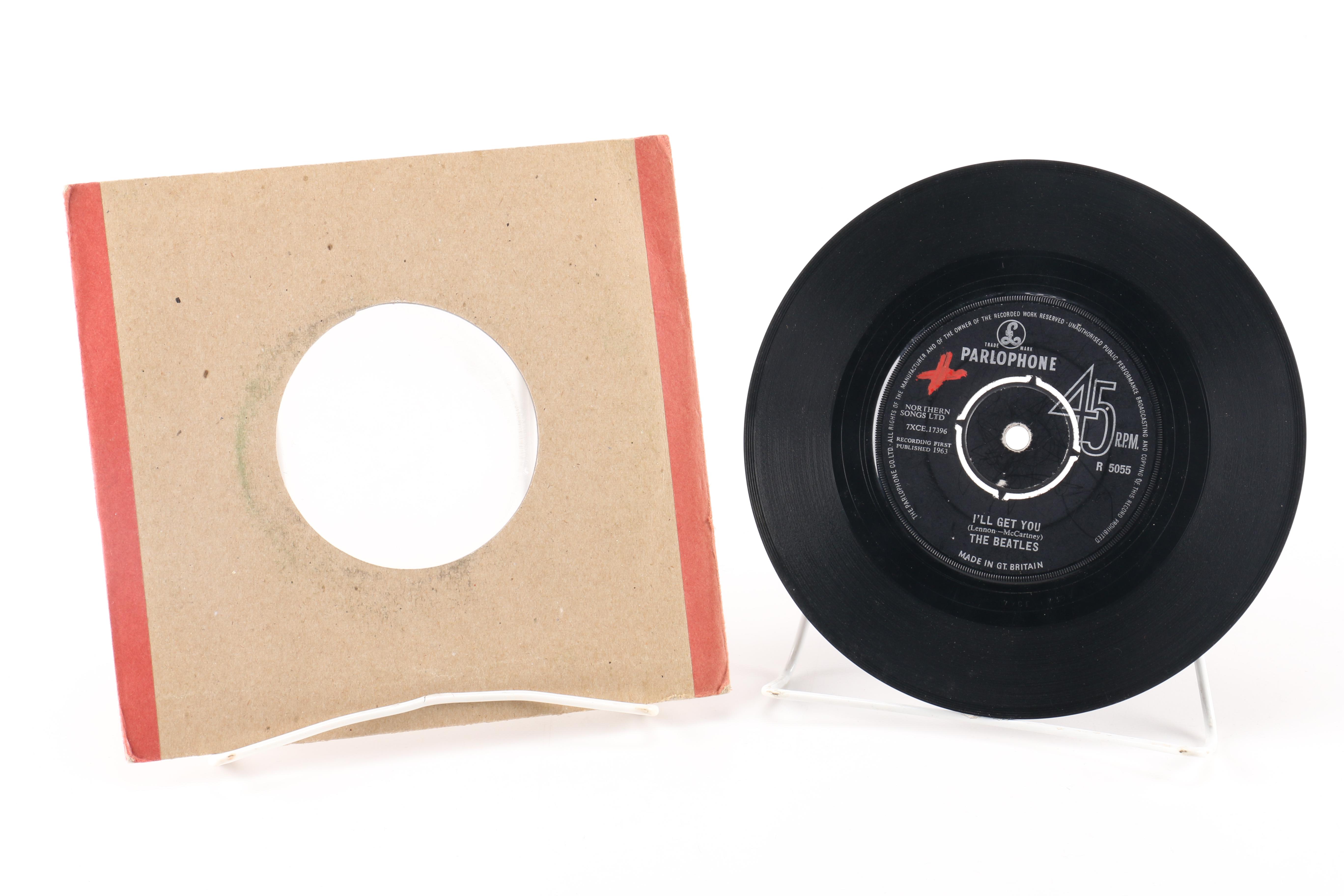 Beatles "She Loves You" on Parlophone and John Lennon Singles