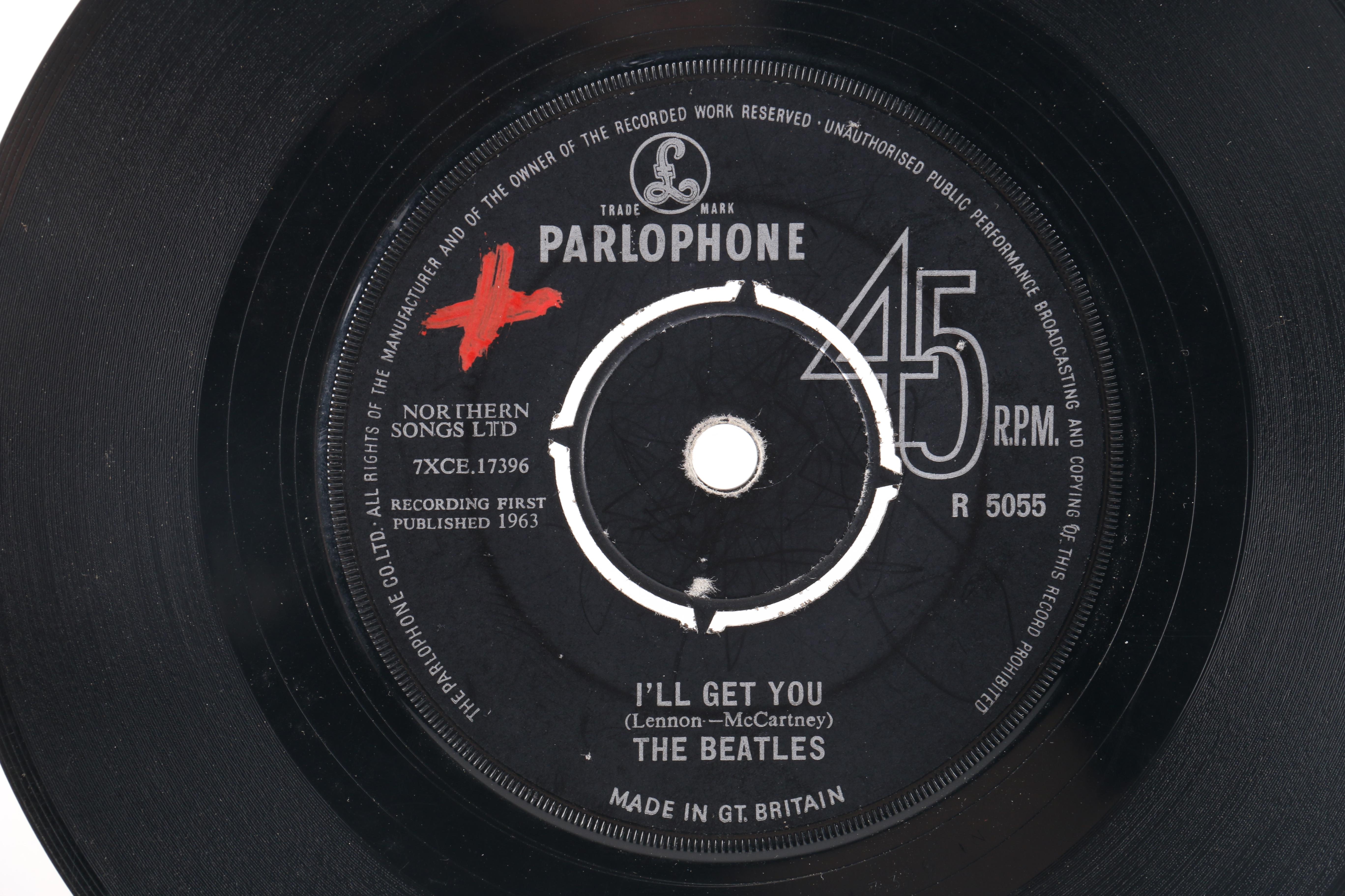 Beatles "She Loves You" on Parlophone and John Lennon Singles