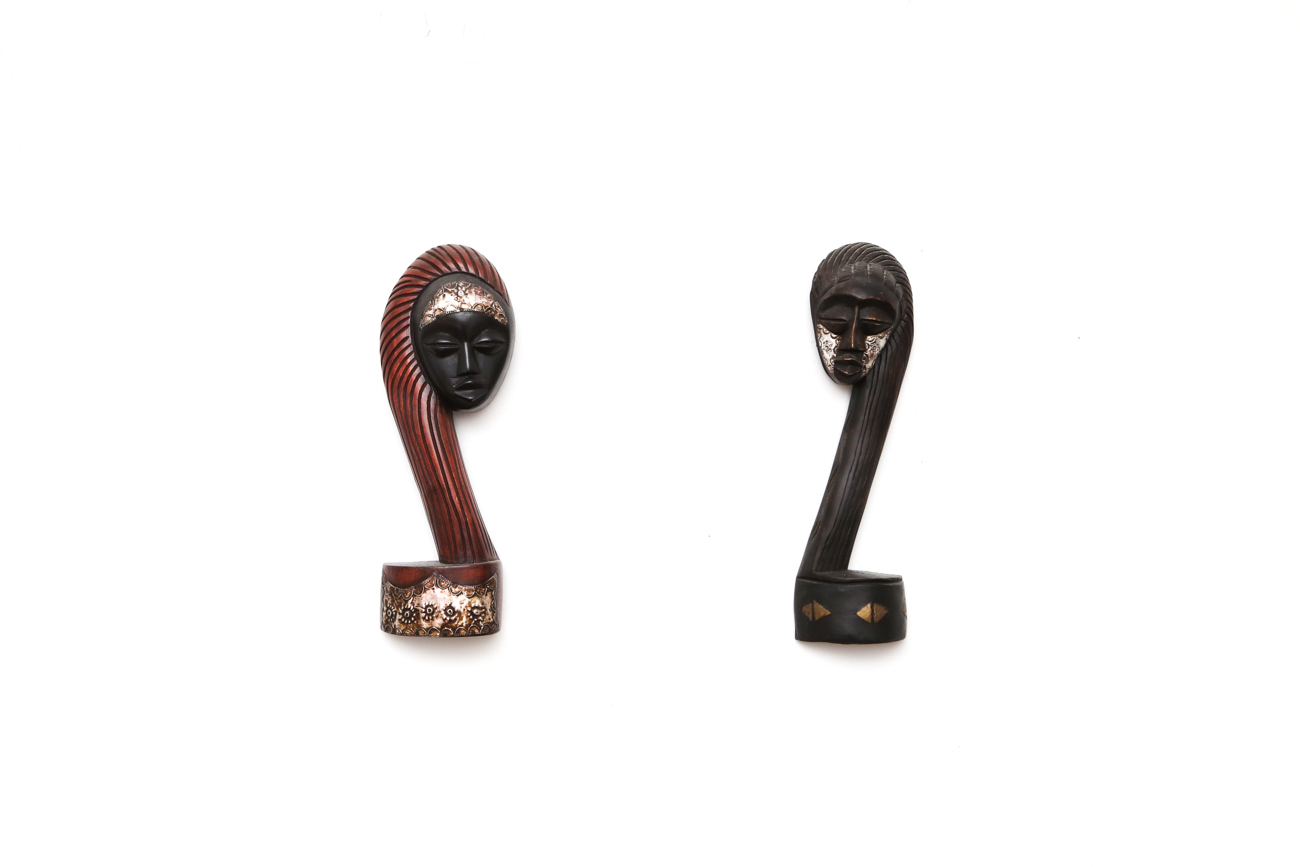 Pair Of Hanging Carved African Busts With Metal Accents