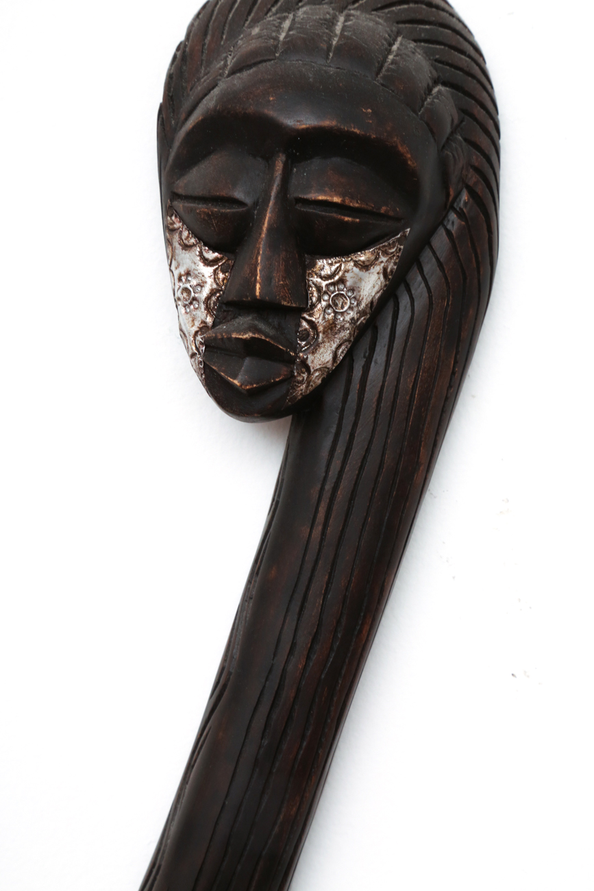 Pair Of Hanging Carved African Busts With Metal Accents