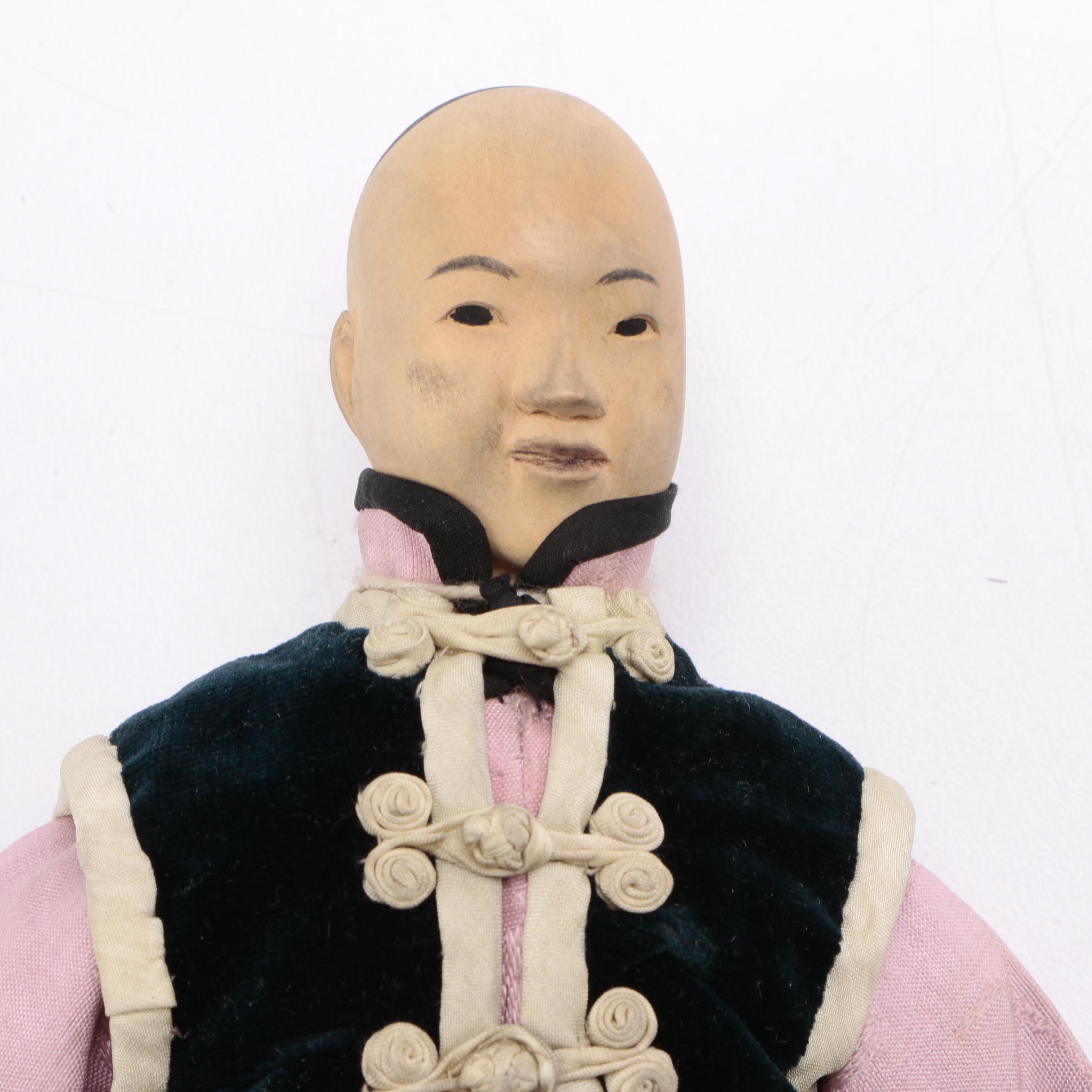 Two Chinese Porcelain Dolls