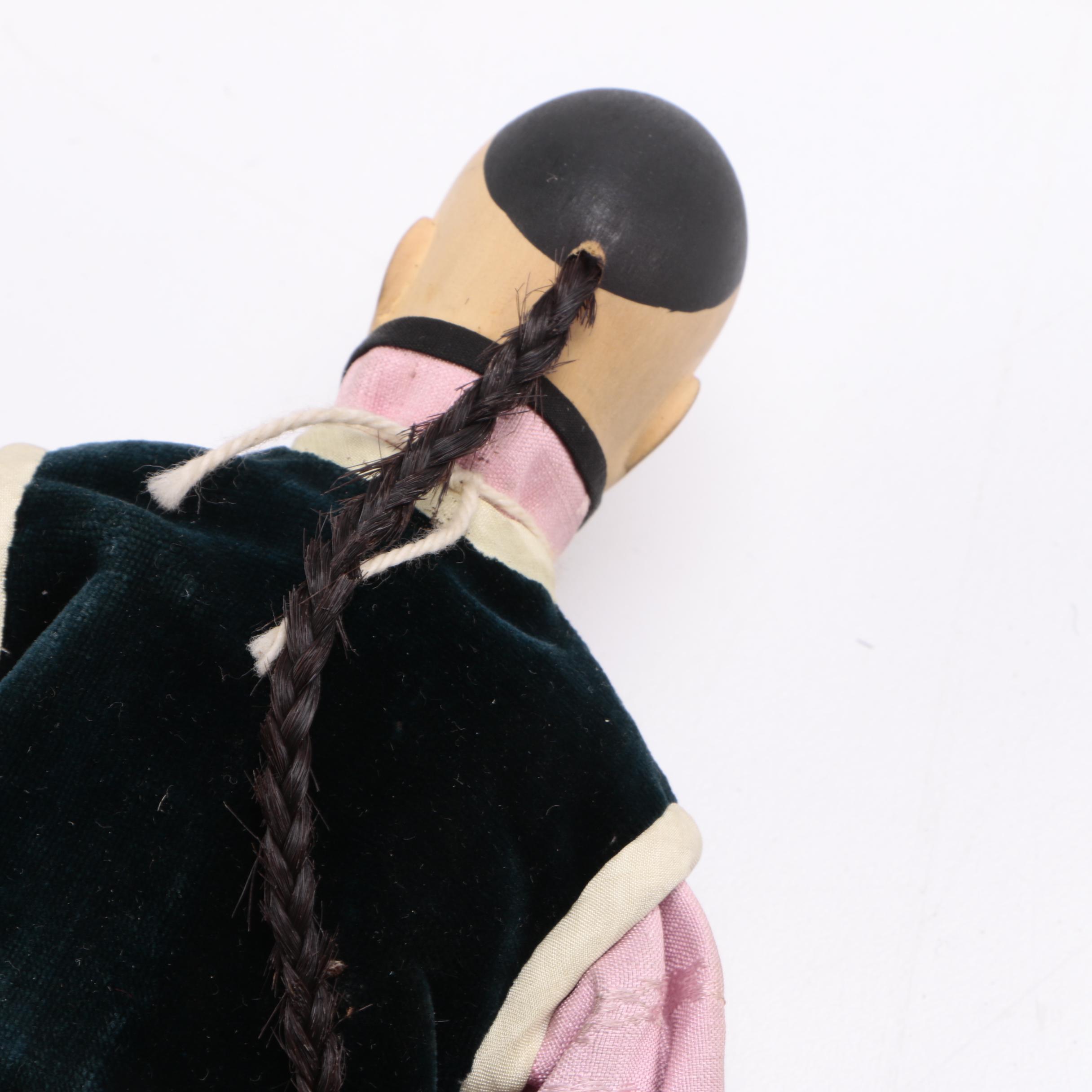 Two Chinese Porcelain Dolls