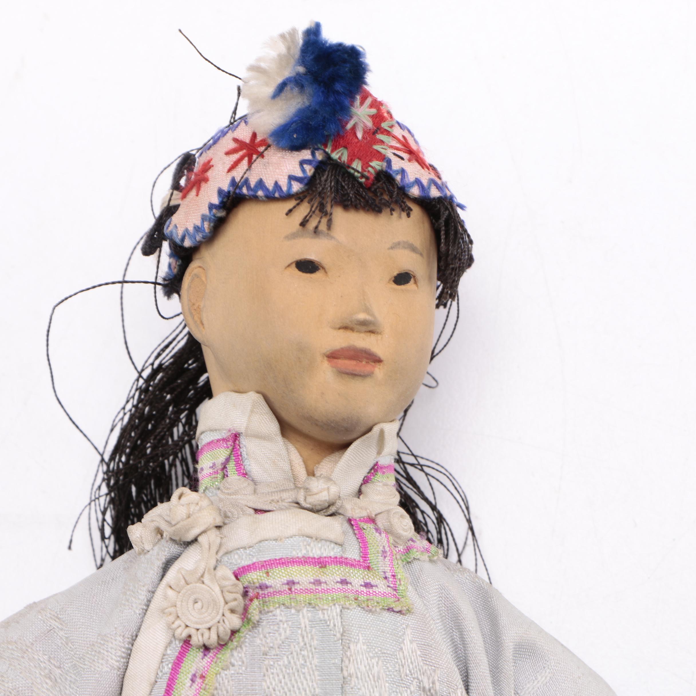 Two Chinese Porcelain Dolls