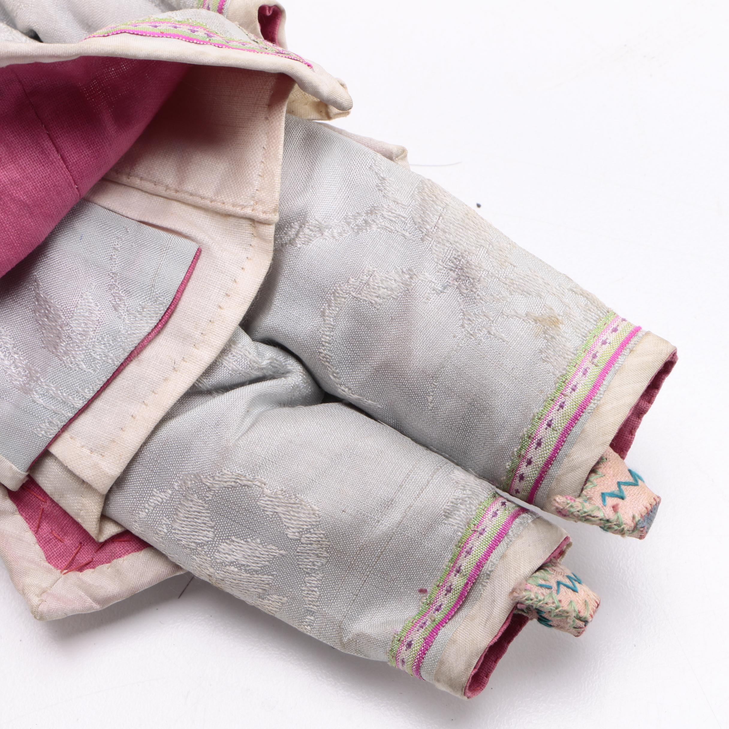 Two Chinese Porcelain Dolls