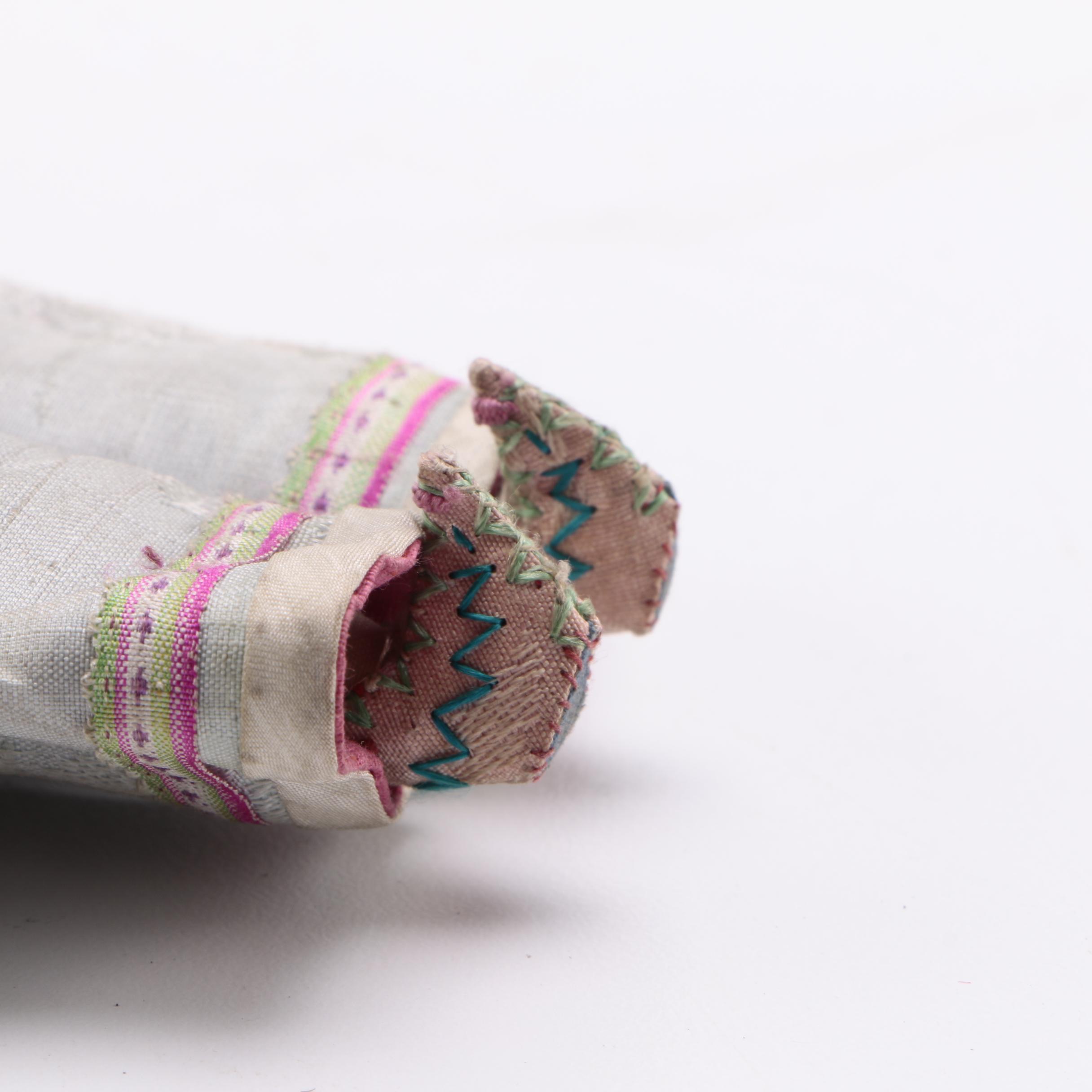 Two Chinese Porcelain Dolls