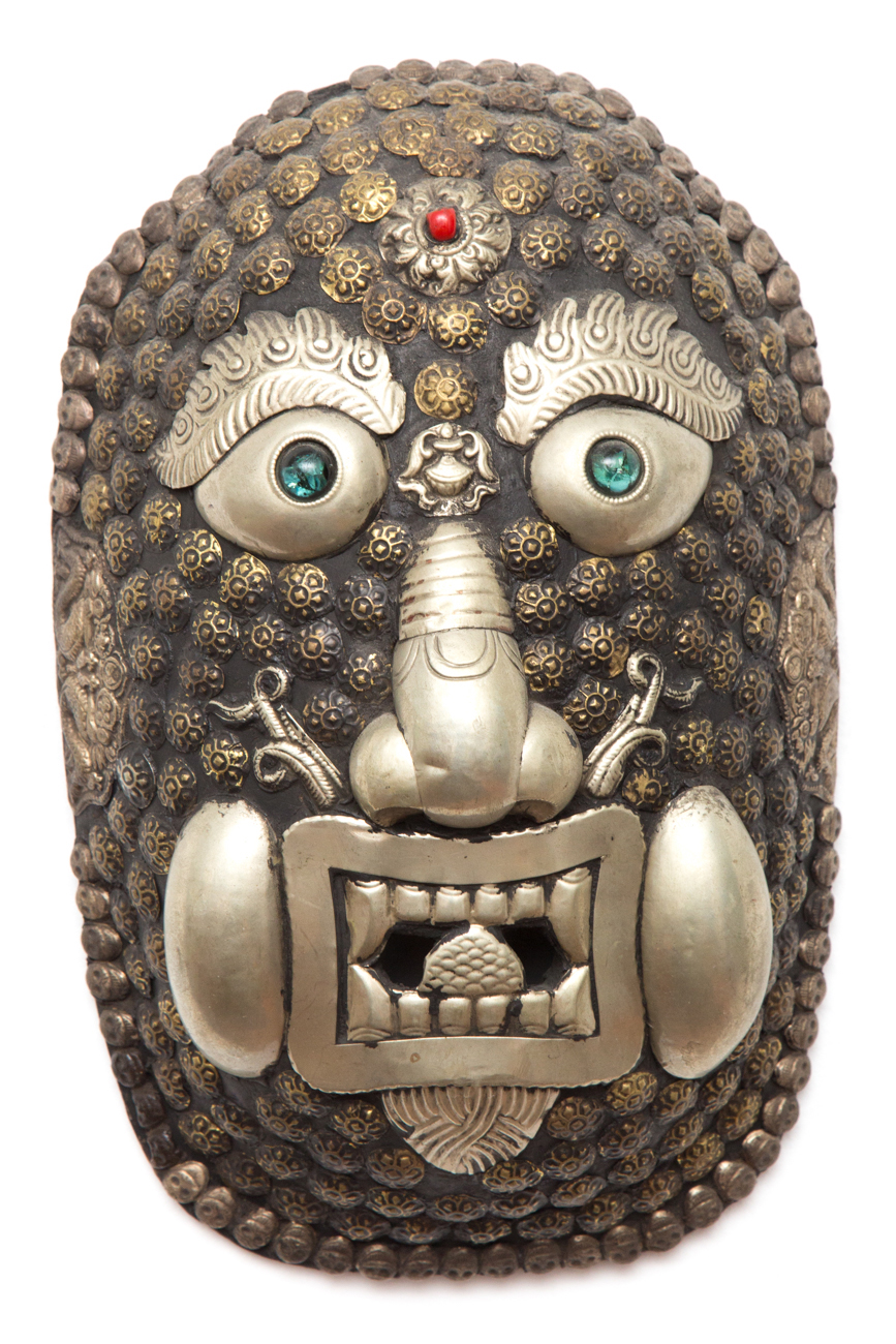 Hand Carved Wooden Mask With Metal Accents