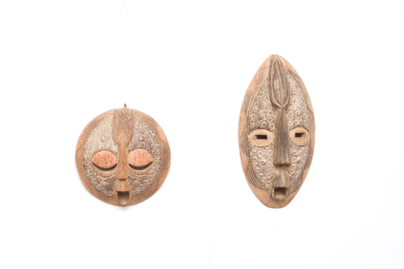 Pair Of Hand Carved Tribal Masks With Metal Accents