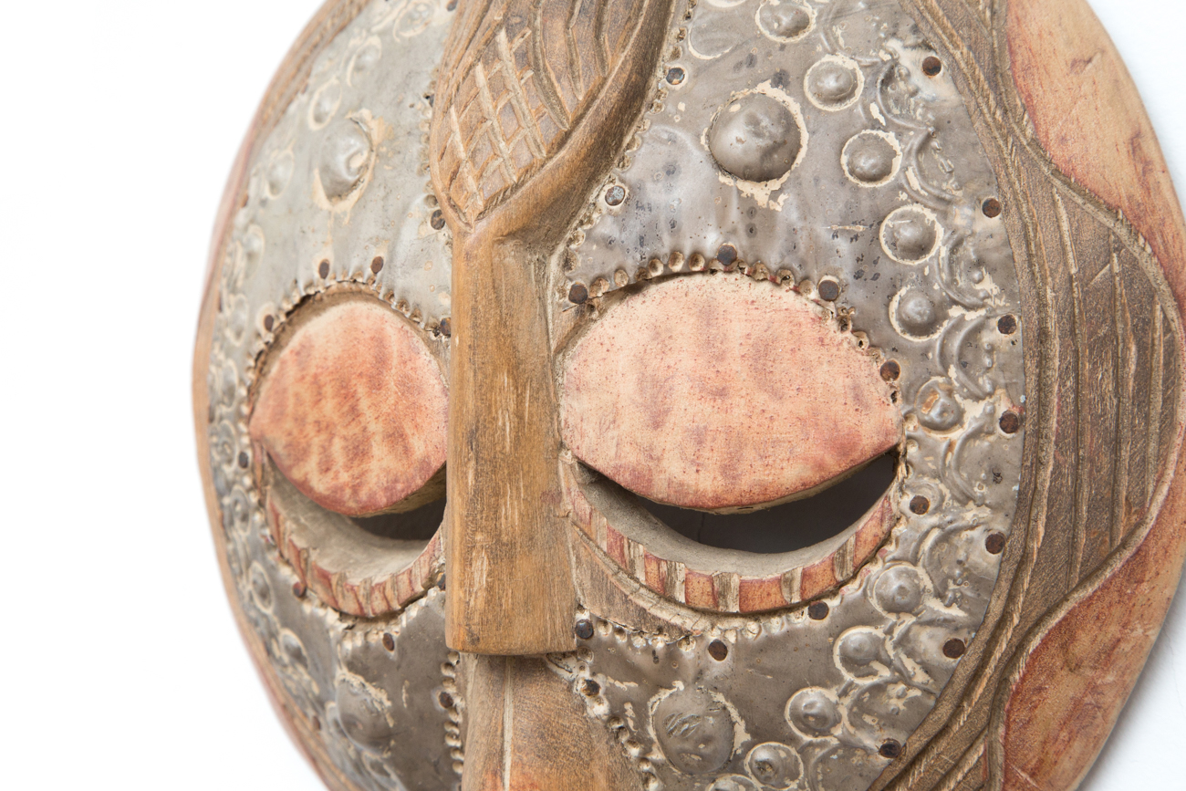 Pair Of Hand Carved Tribal Masks With Metal Accents