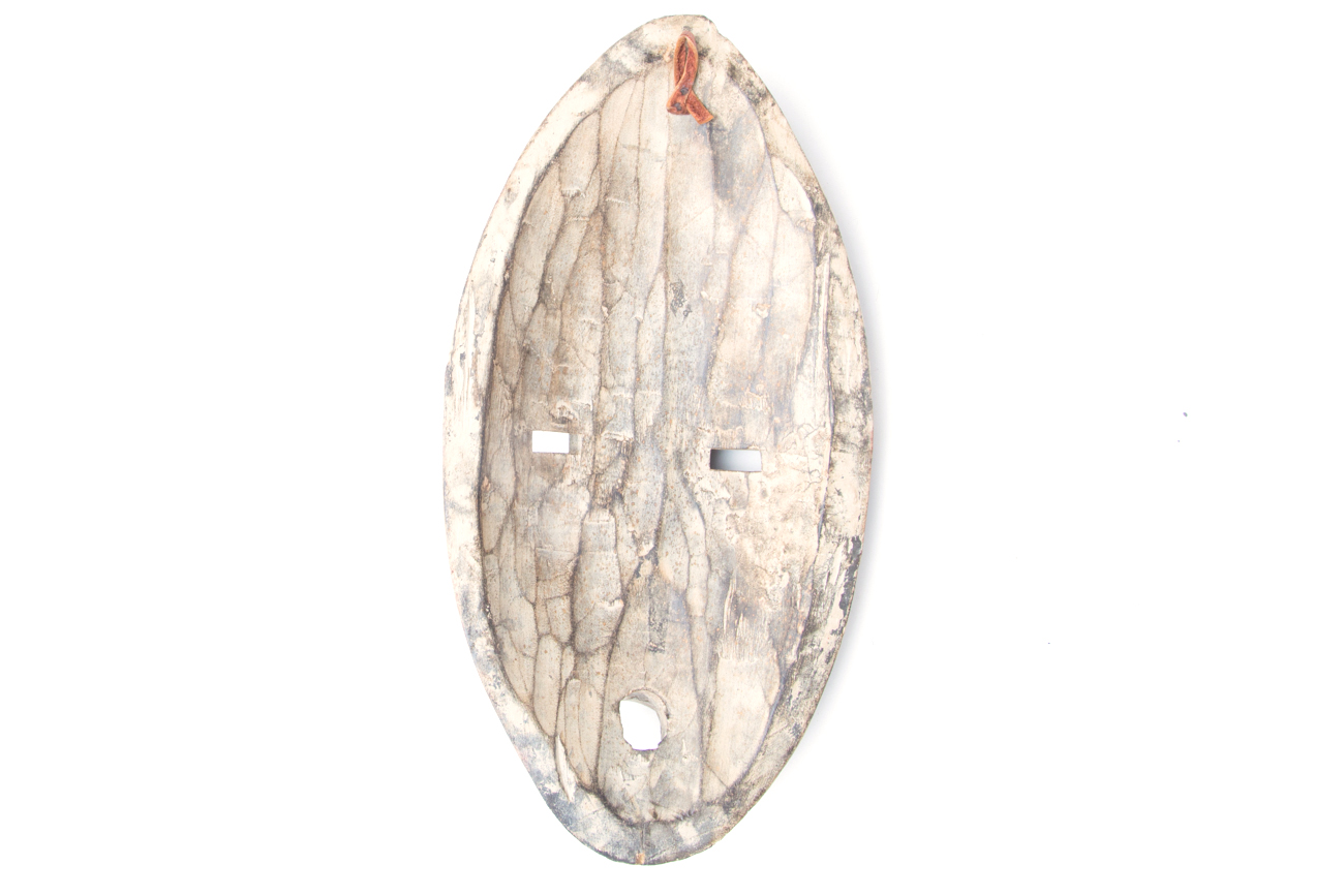 Pair Of Hand Carved Tribal Masks With Metal Accents