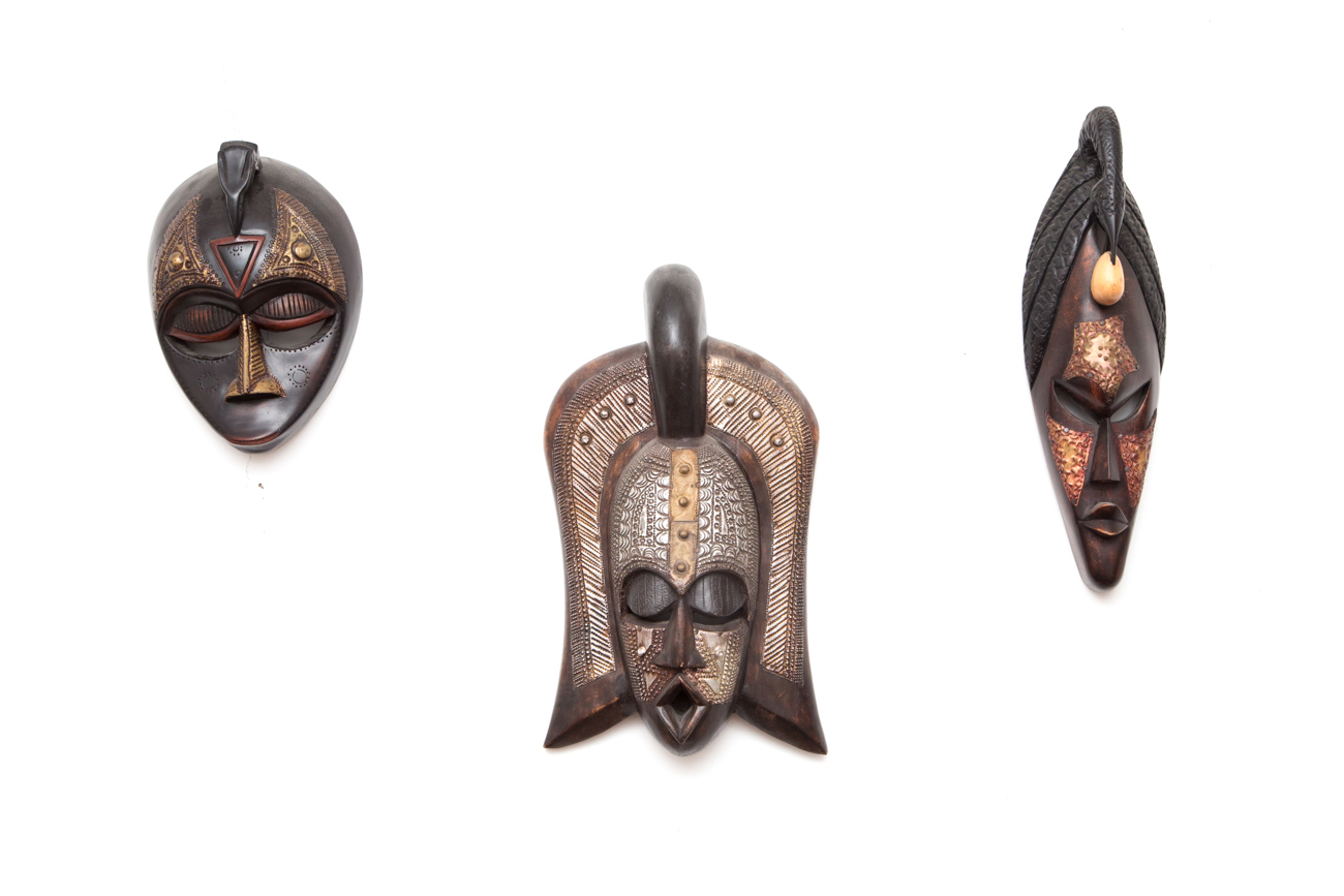 Grouping Of Hand Carved Masks With Hammered Metal Details