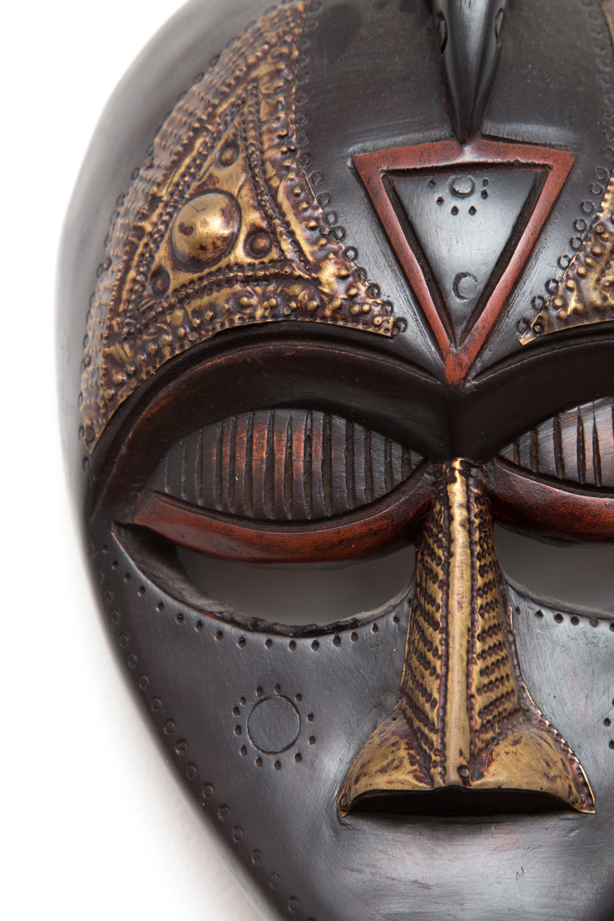 Grouping Of Hand Carved Masks With Hammered Metal Details