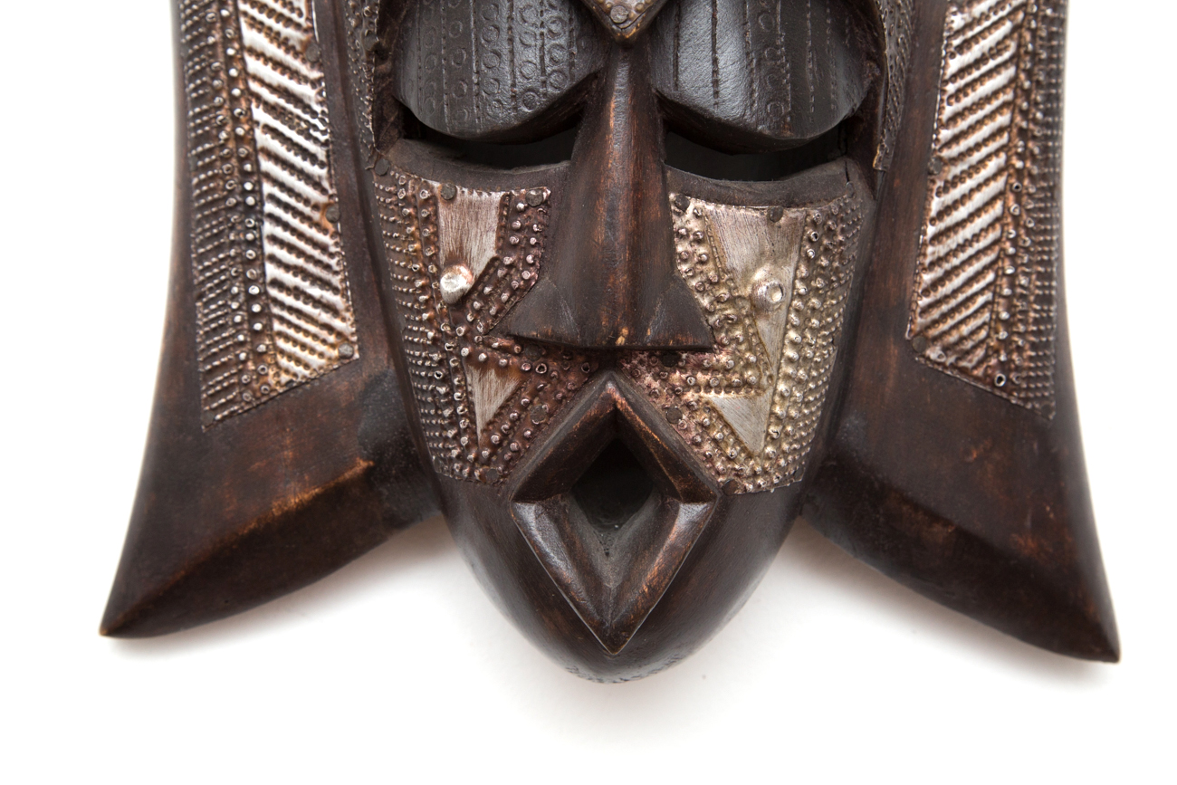 Grouping Of Hand Carved Masks With Hammered Metal Details