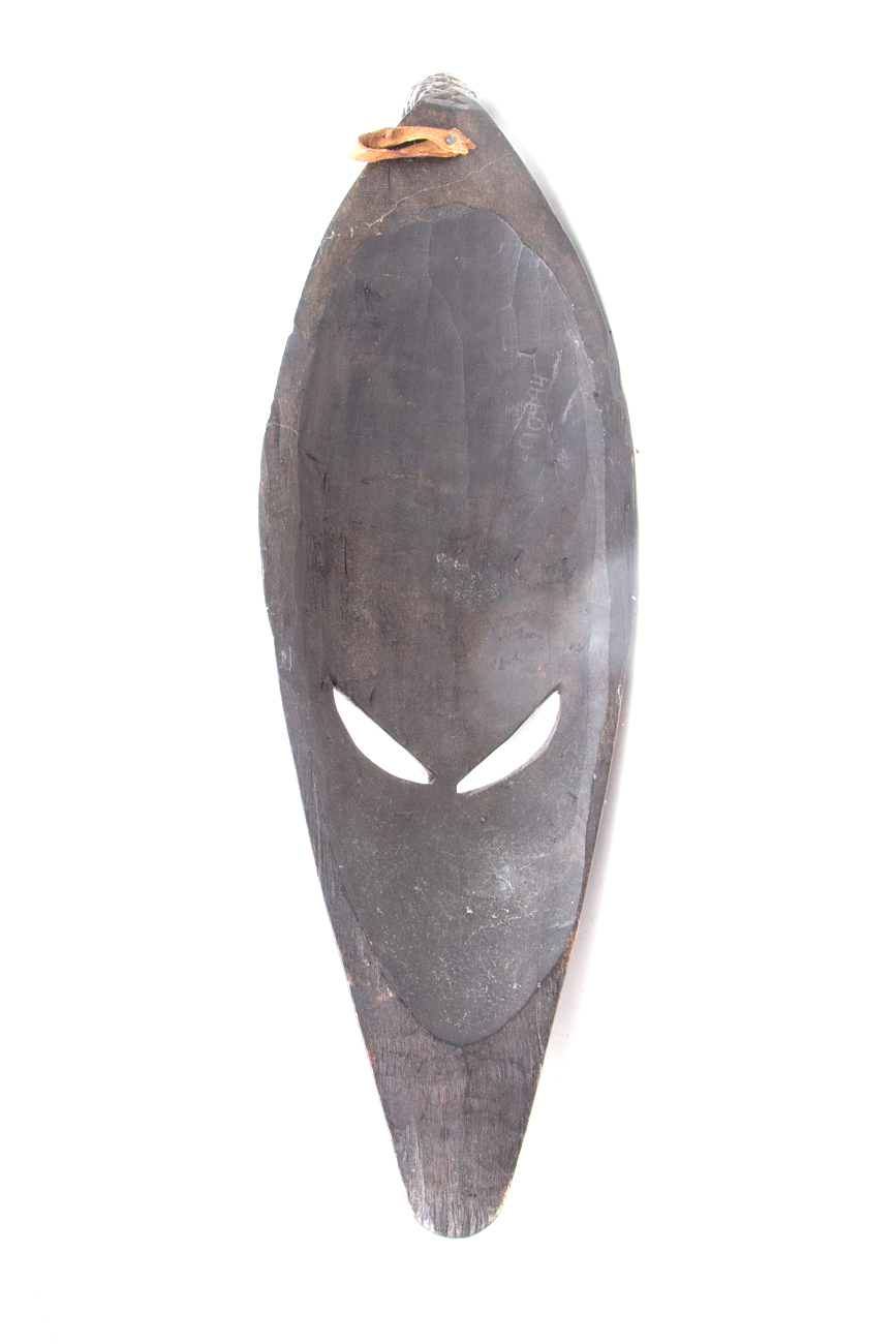 Grouping Of Hand Carved Masks With Hammered Metal Details