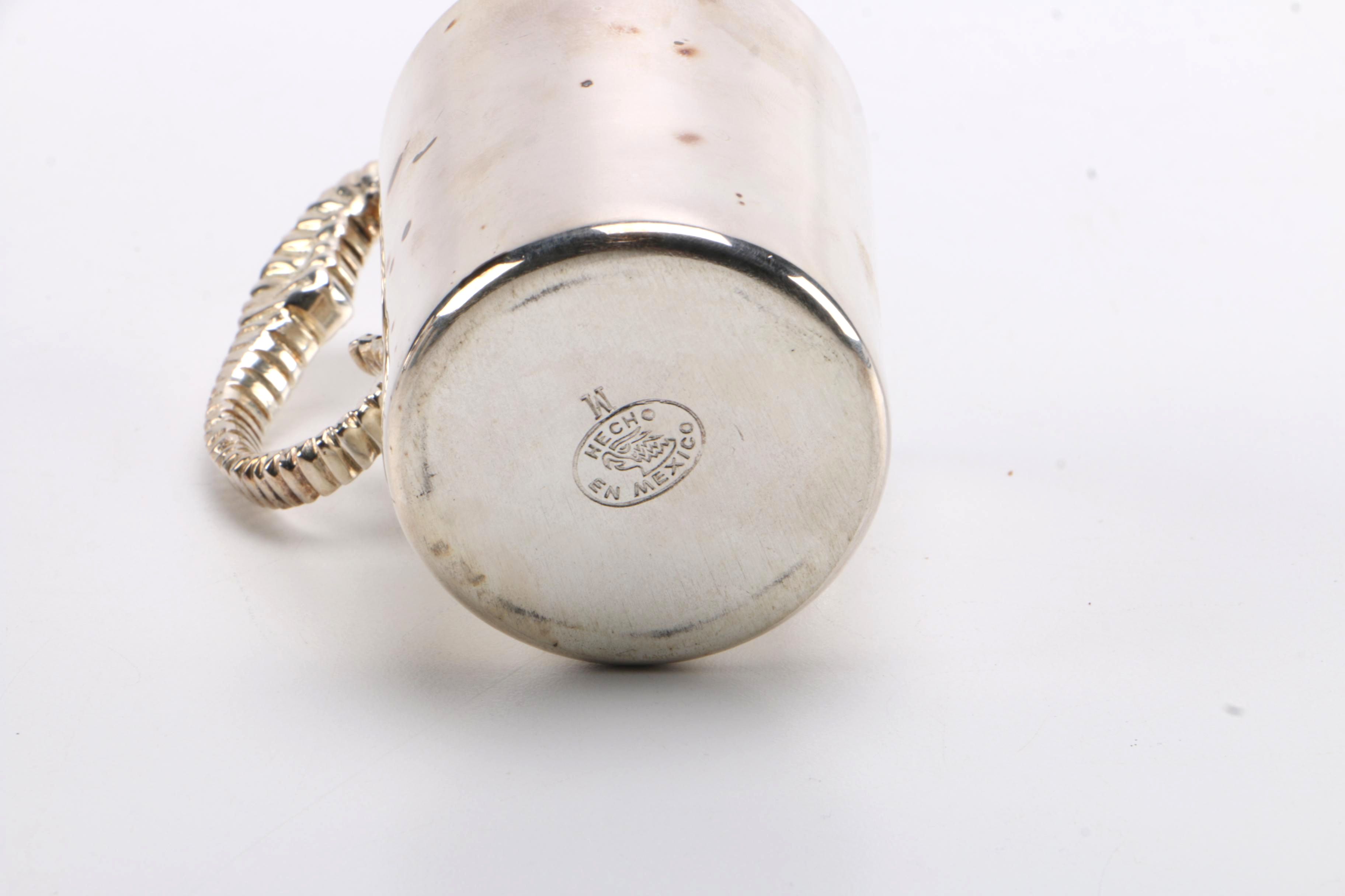 Steel Sea Horse Handled Jugs