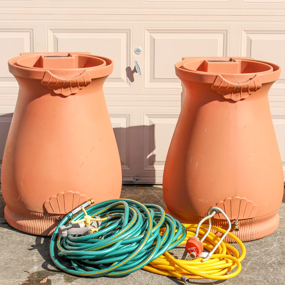 Pair of Rain Wizard Urns With Hoses