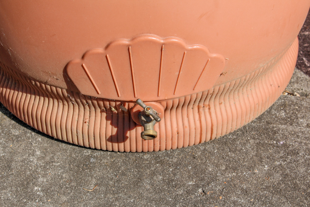 Pair of Rain Wizard Urns With Hoses
