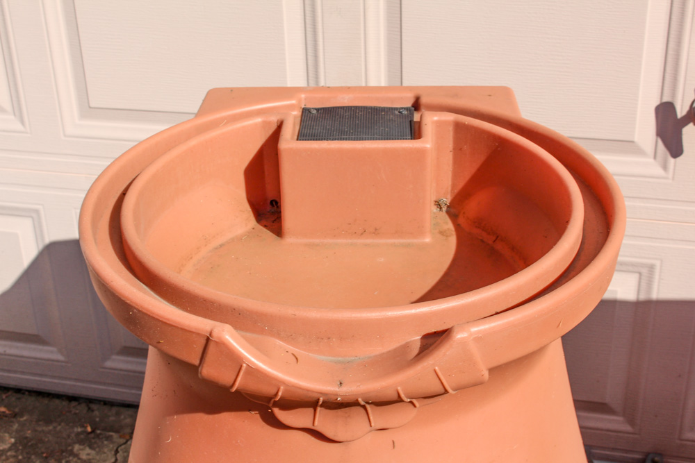 Pair of Rain Wizard Urns With Hoses