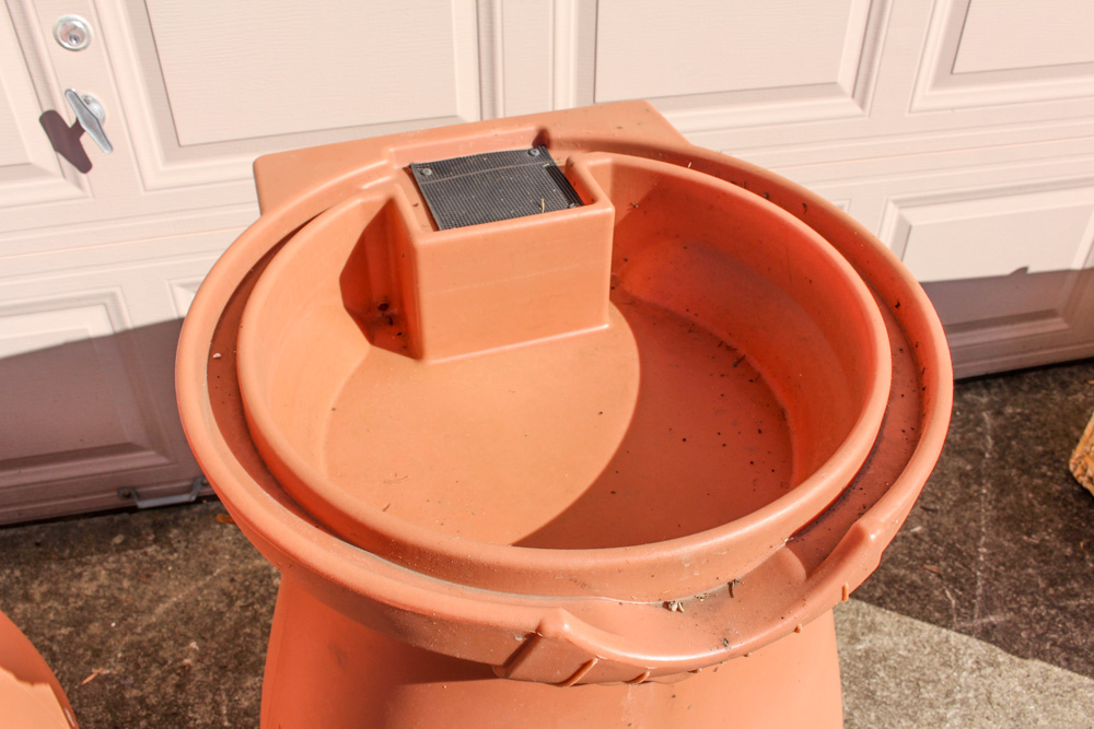 Pair of Rain Wizard Urns With Hoses