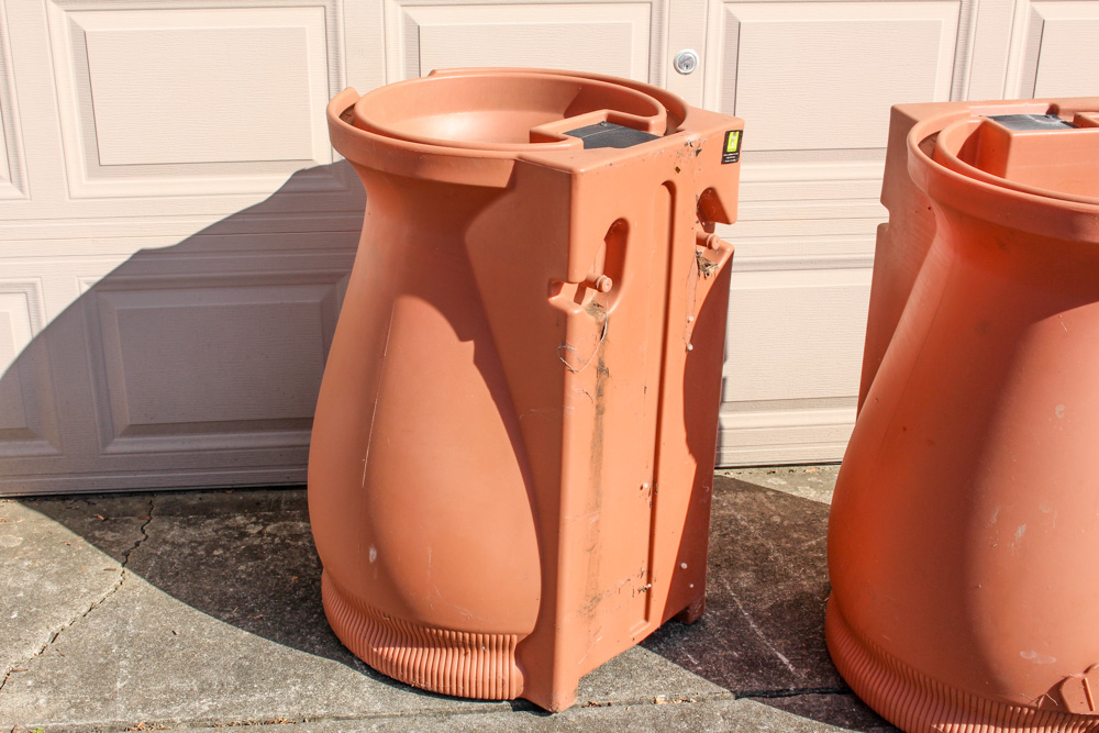 Pair of Rain Wizard Urns With Hoses