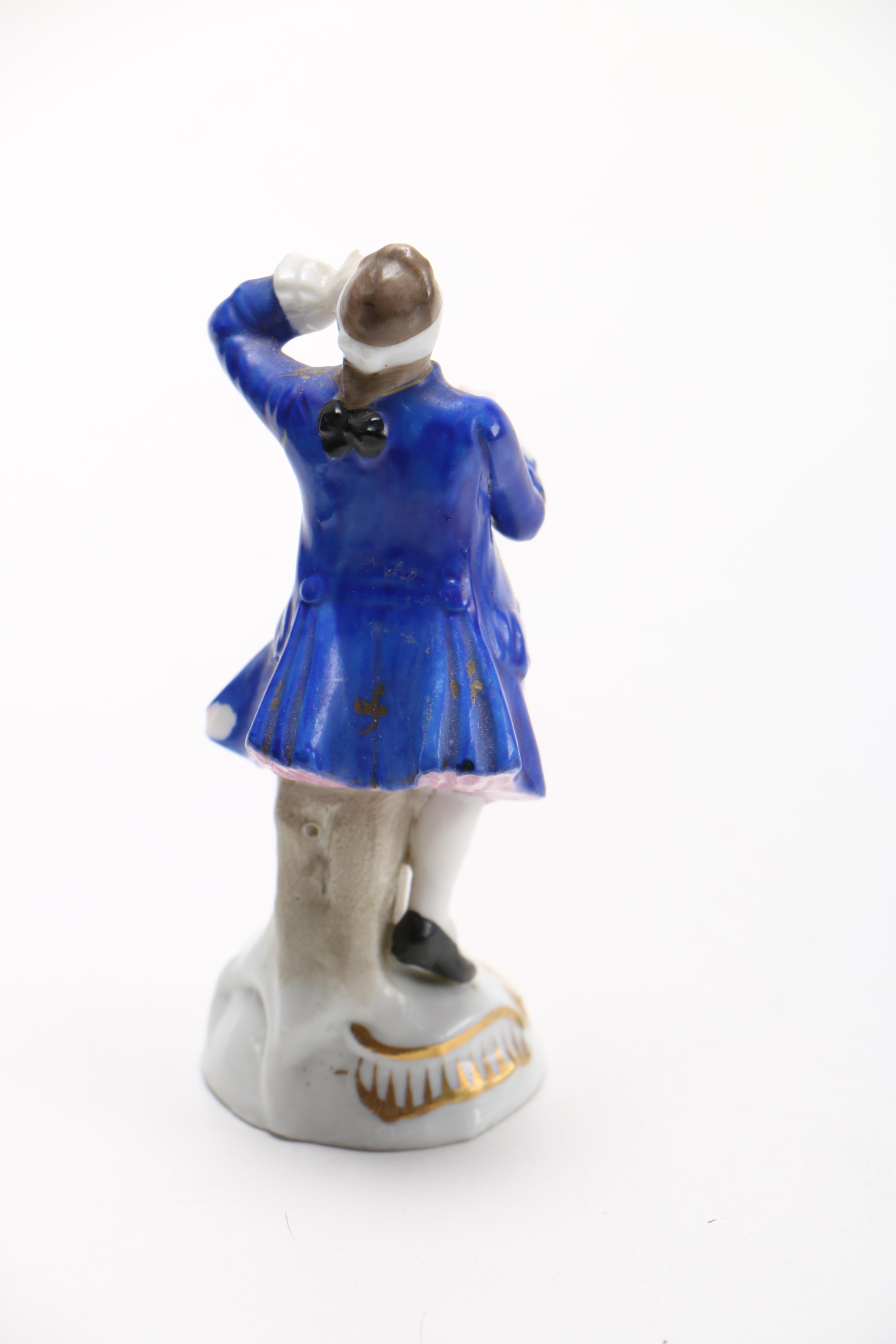 Porcelain Figurine and Jay Strongwater Picture Frame