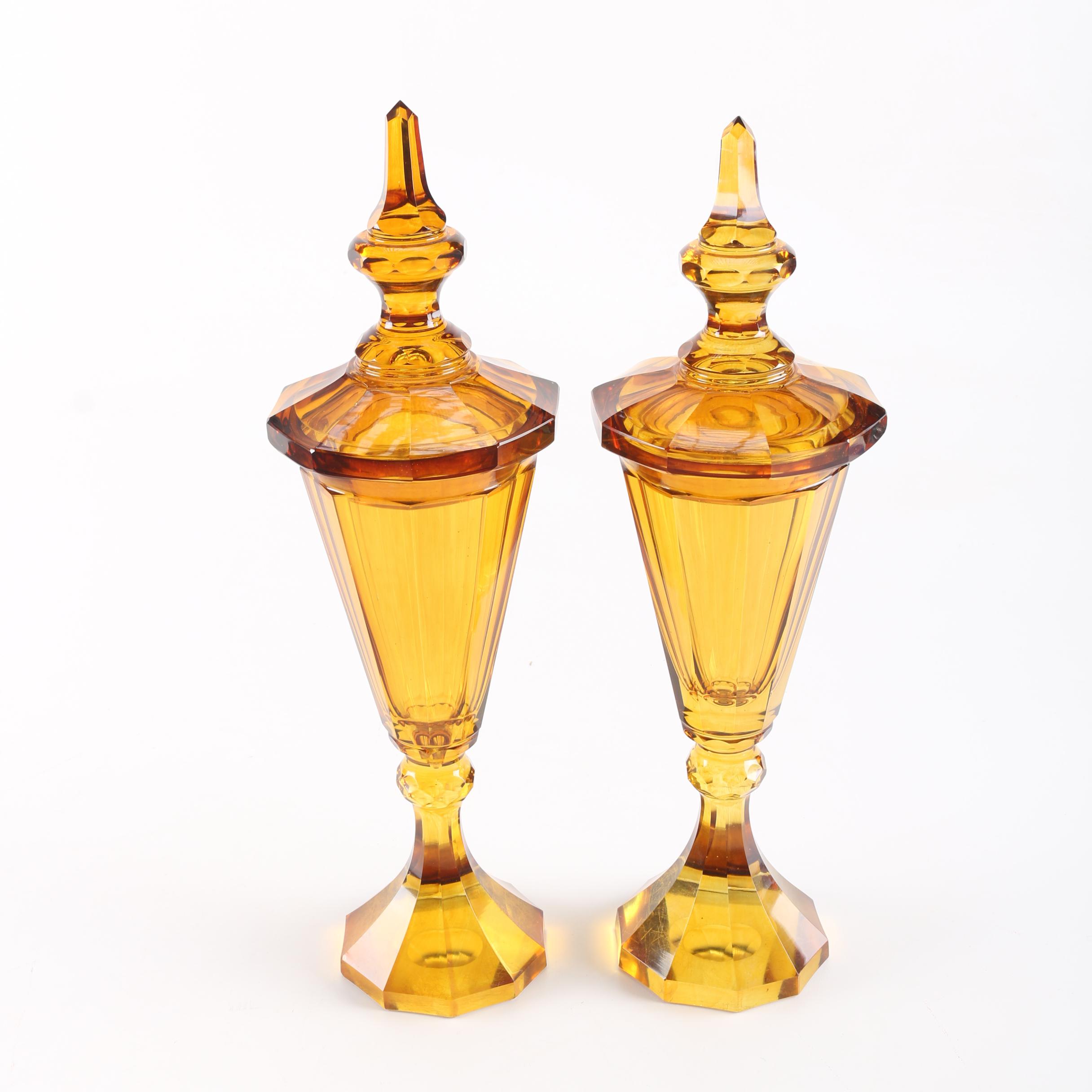 Pair of Amber-Colored Glass Lidded Urns